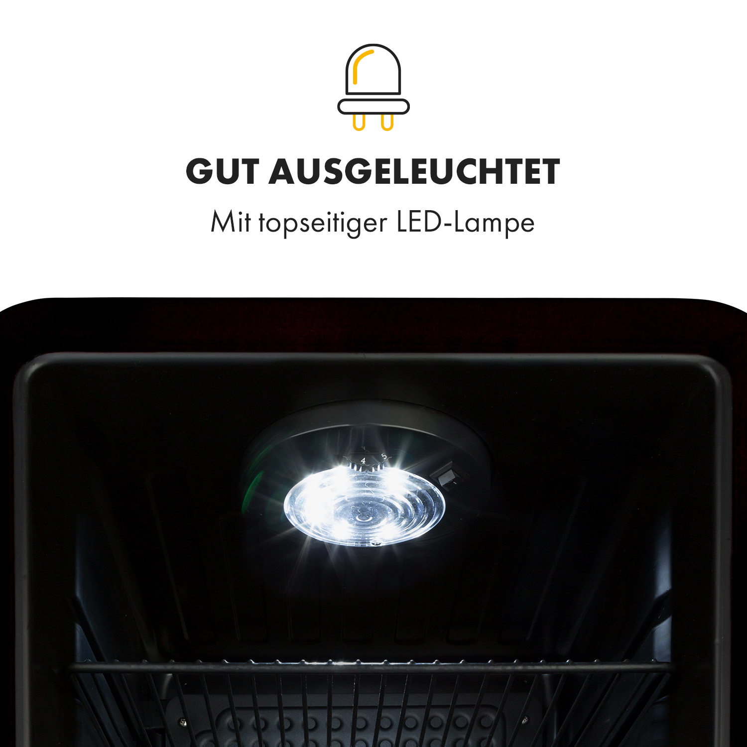 All'interno di un elettrodomestico scuro, una luce LED brillante dall'alto.