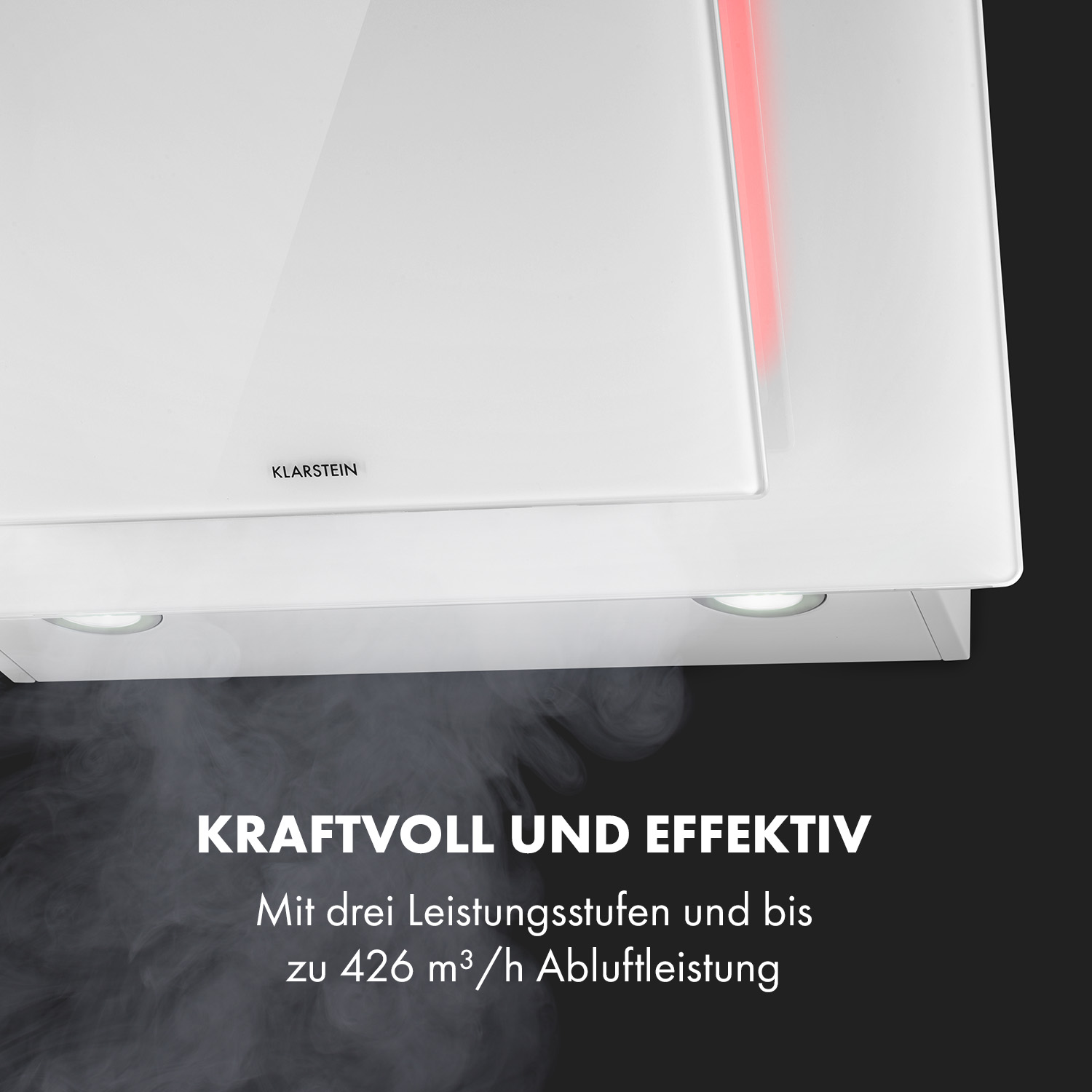 Cappa da cucina bianca con luce rossa e testo: 'Kraftvoll und Effektiv'. Esce vapore.