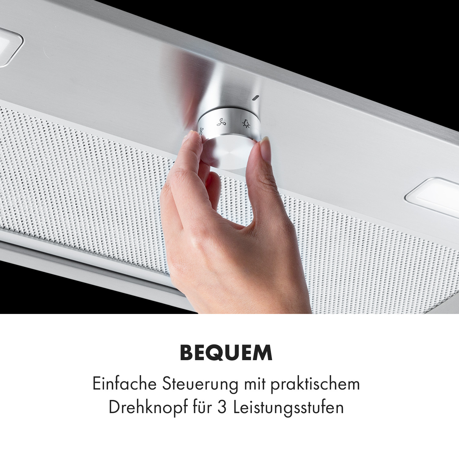 Nahaufnahme einer Hand, die einen Drehregler an einer Dunstabzugshaube einstellt. Der Regler hat Einstellungen.