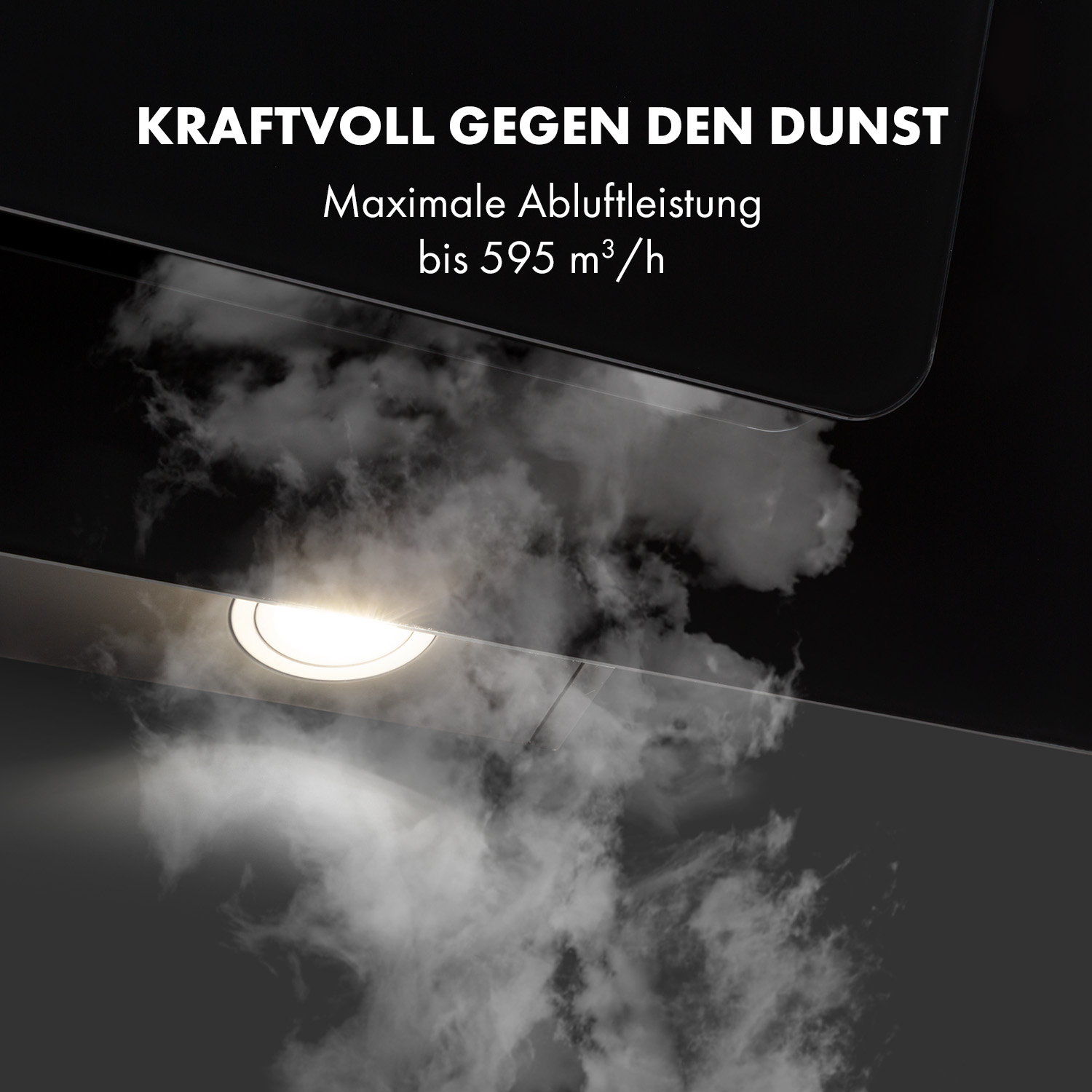 Un elettrodomestico nero con fumo che esce. Testo: KRAFTVOLL GEGEN DEN DUNST, potente contro i fumi.