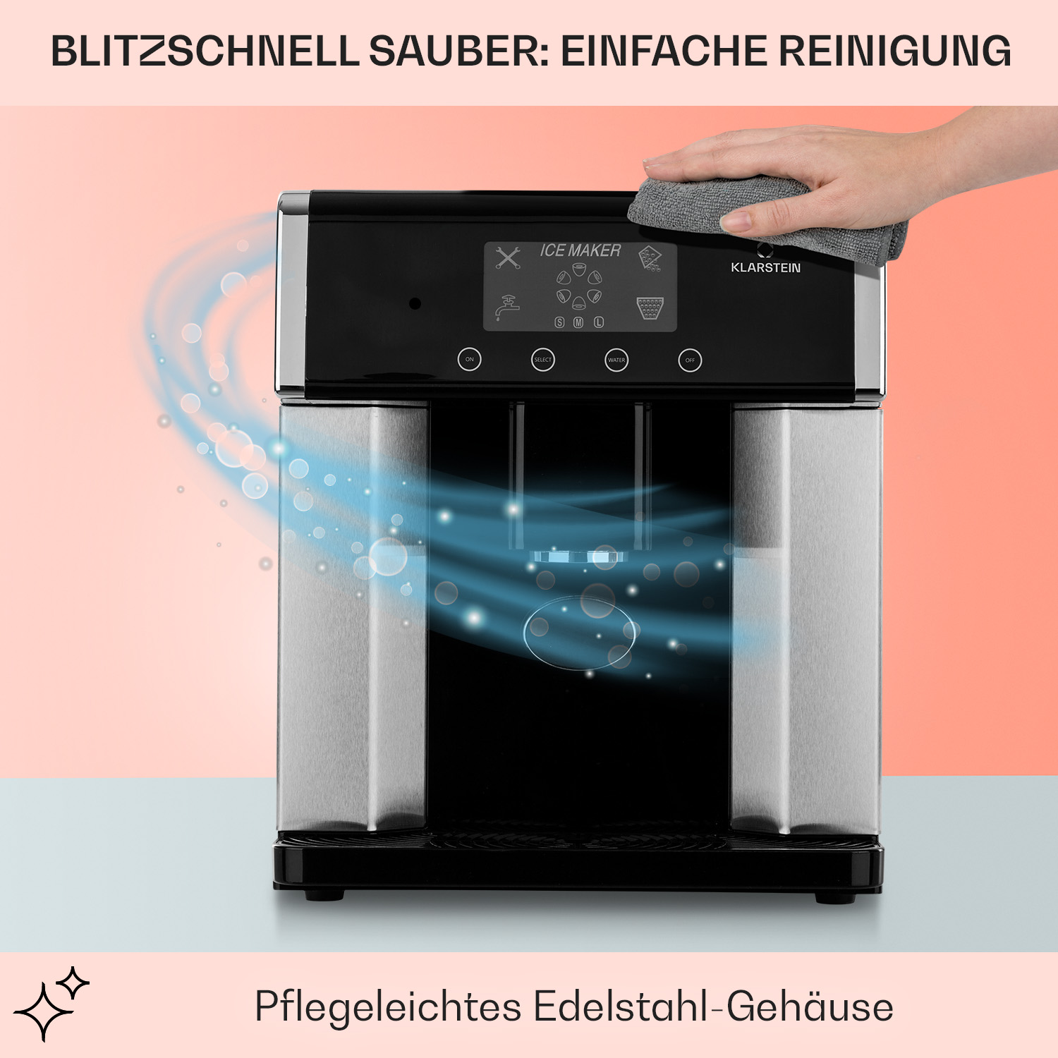 Eisbereiter-Reinigung. Eine Hand wischt die Oberseite ab. Silbernes Gehäuse, schwarze Frontplatte. Rosa Hintergrund.