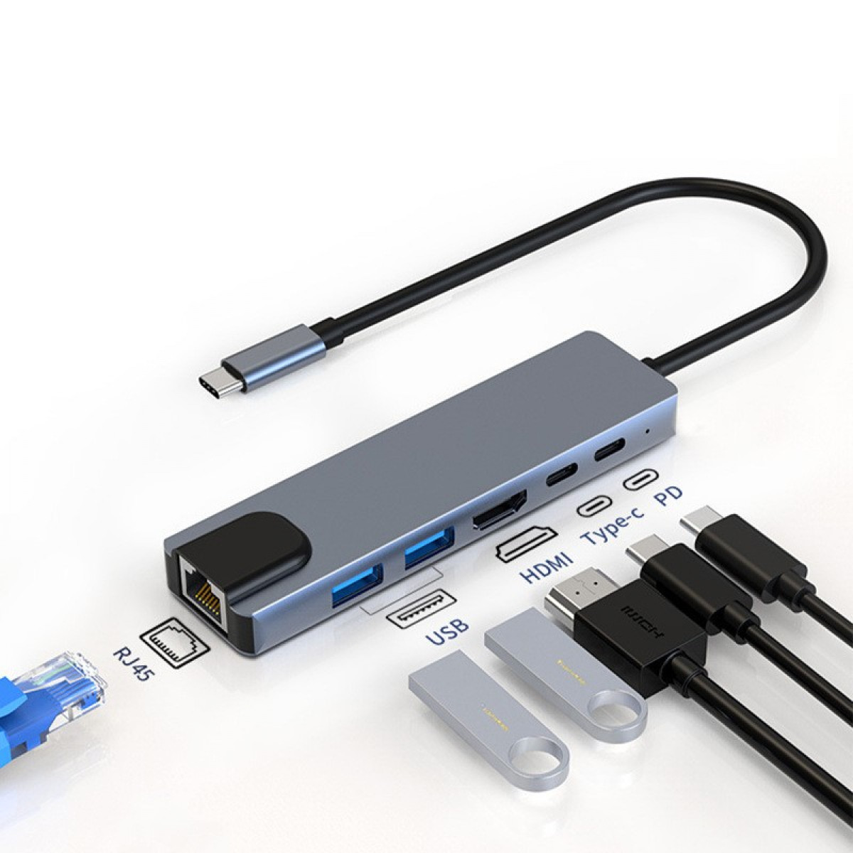Ein grauer USB-Hub mit verschiedenen Anschlüssen und angeschlossenen Kabeln.