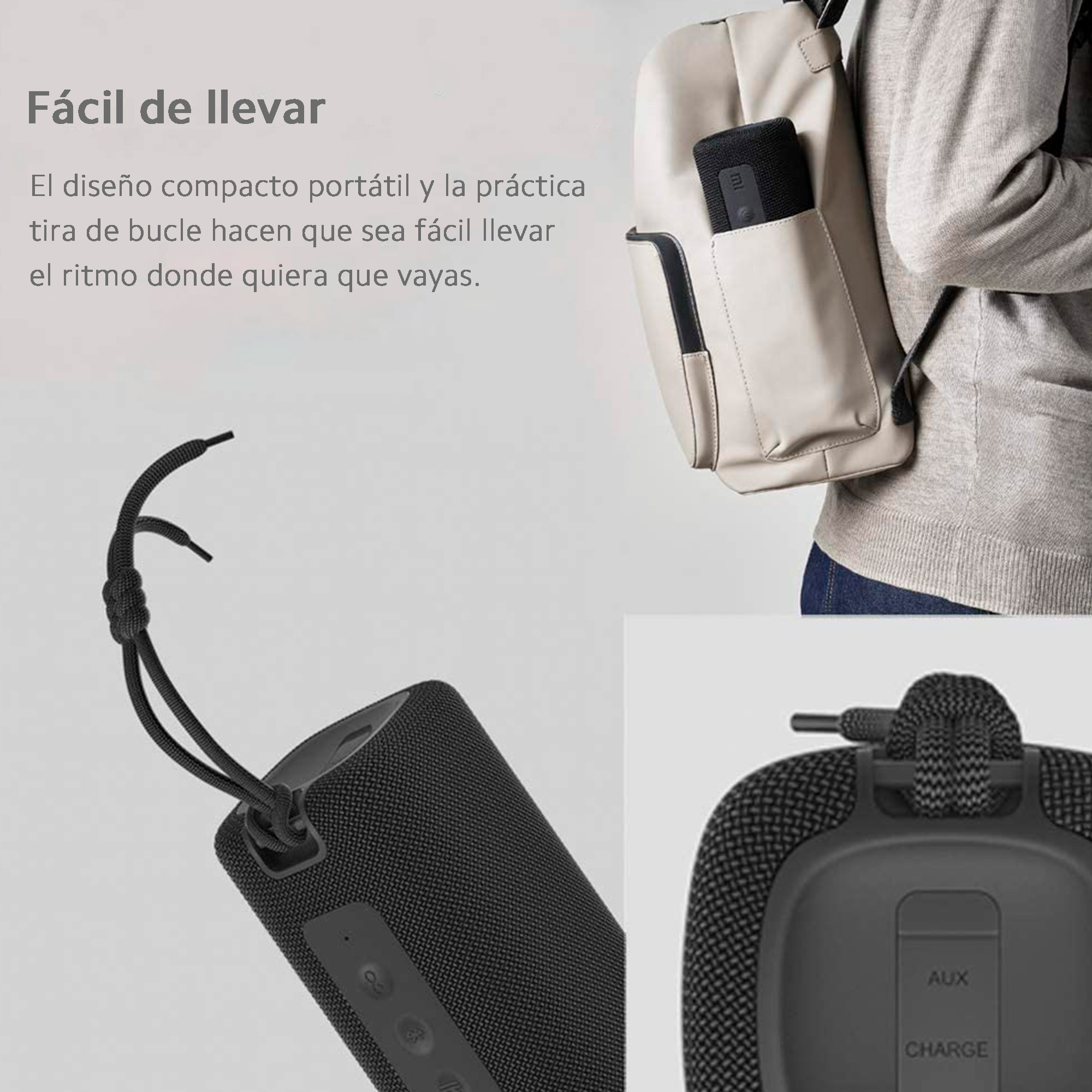 Czarny głośnik przenośny, z pętlą do przenoszenia i osobą z niego korzystającą.