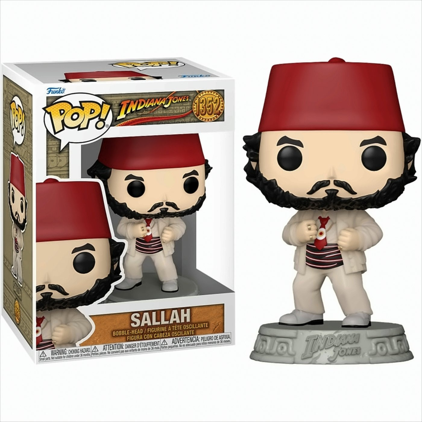 Sallah-Figur mit rotem Fes. Verpackt, beschriftet mit 'Indiana Jones'. Auf der Basis steht 'Indiana Jones'.