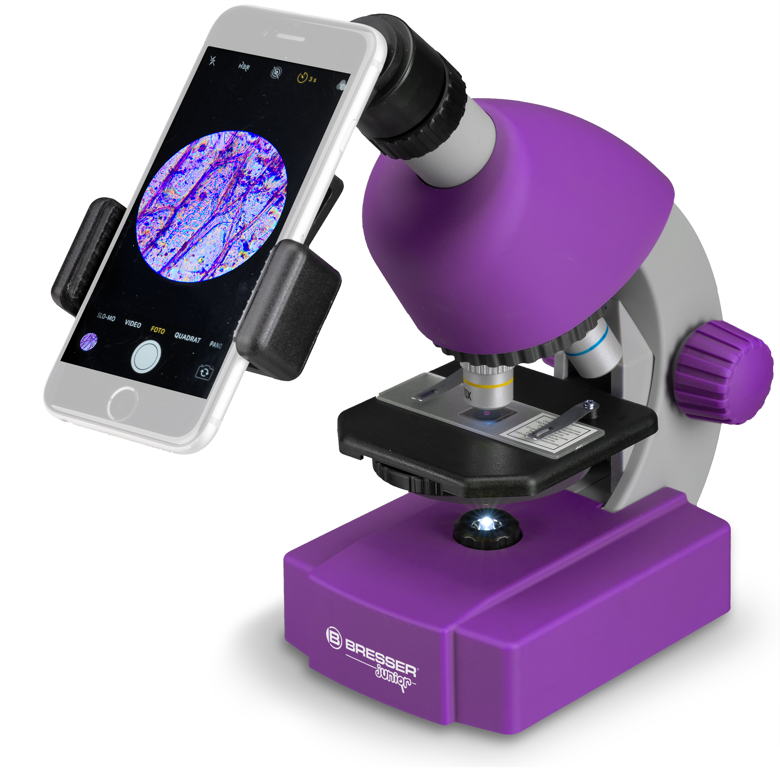 Lila Mikroskop mit Telefon. Das Telefon zeigt eine Zellprobe.