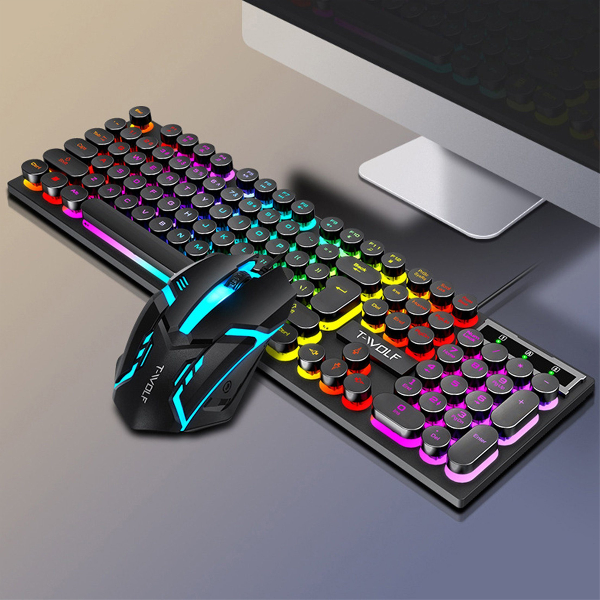 Gaming-Tastatur- und Maus-Set. Tastatur hat bunte Tasten. Schwarze und blaue Maus.
