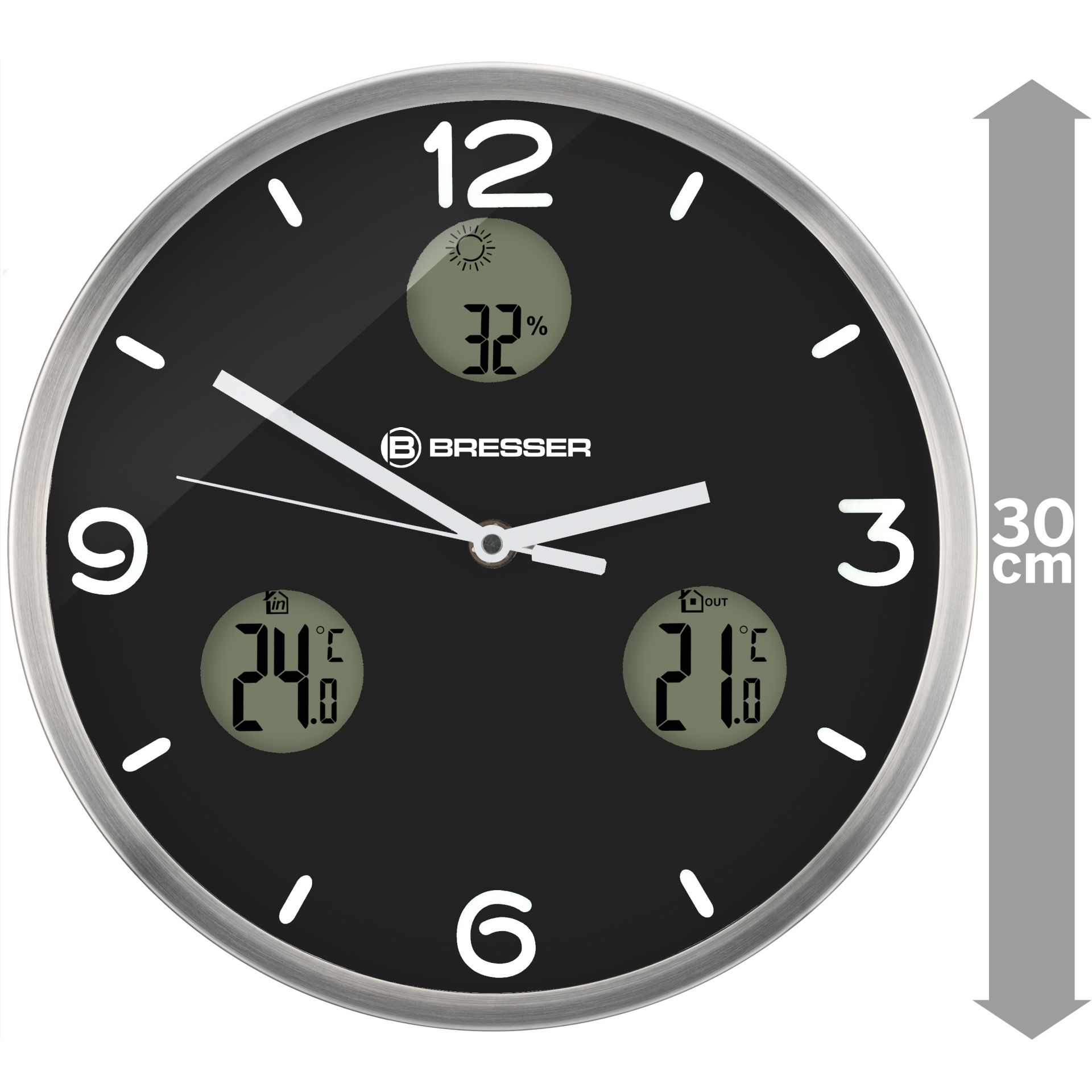 Un reloj de pared redondo negro con números y manecillas blancas. Muestra la temperatura y la humedad.