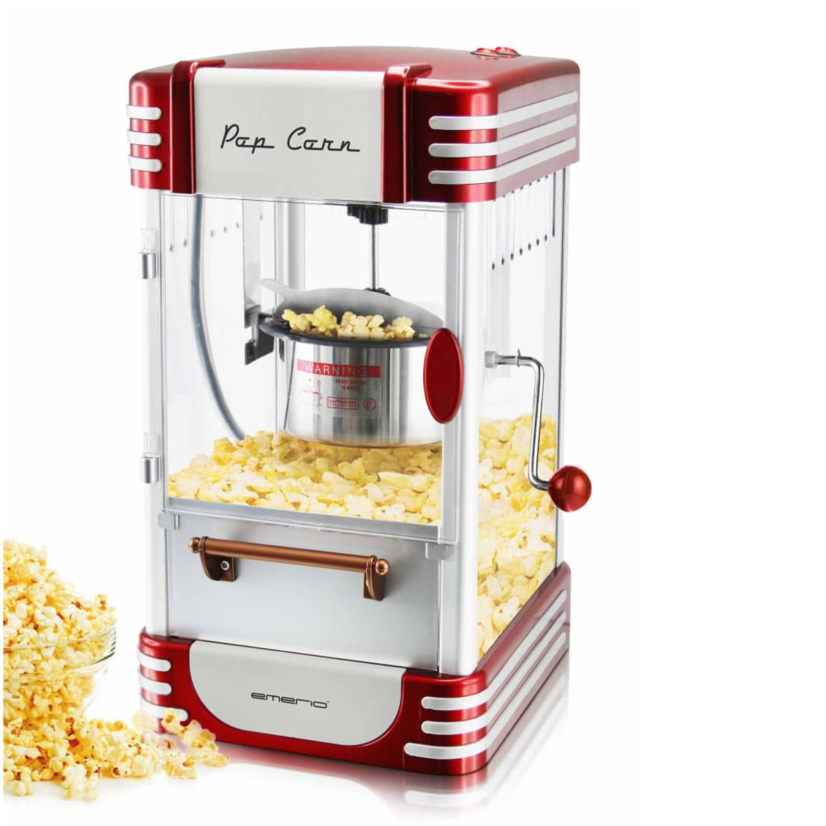 Máquina de palomitas roja y plateada con palomitas dentro y al lado.