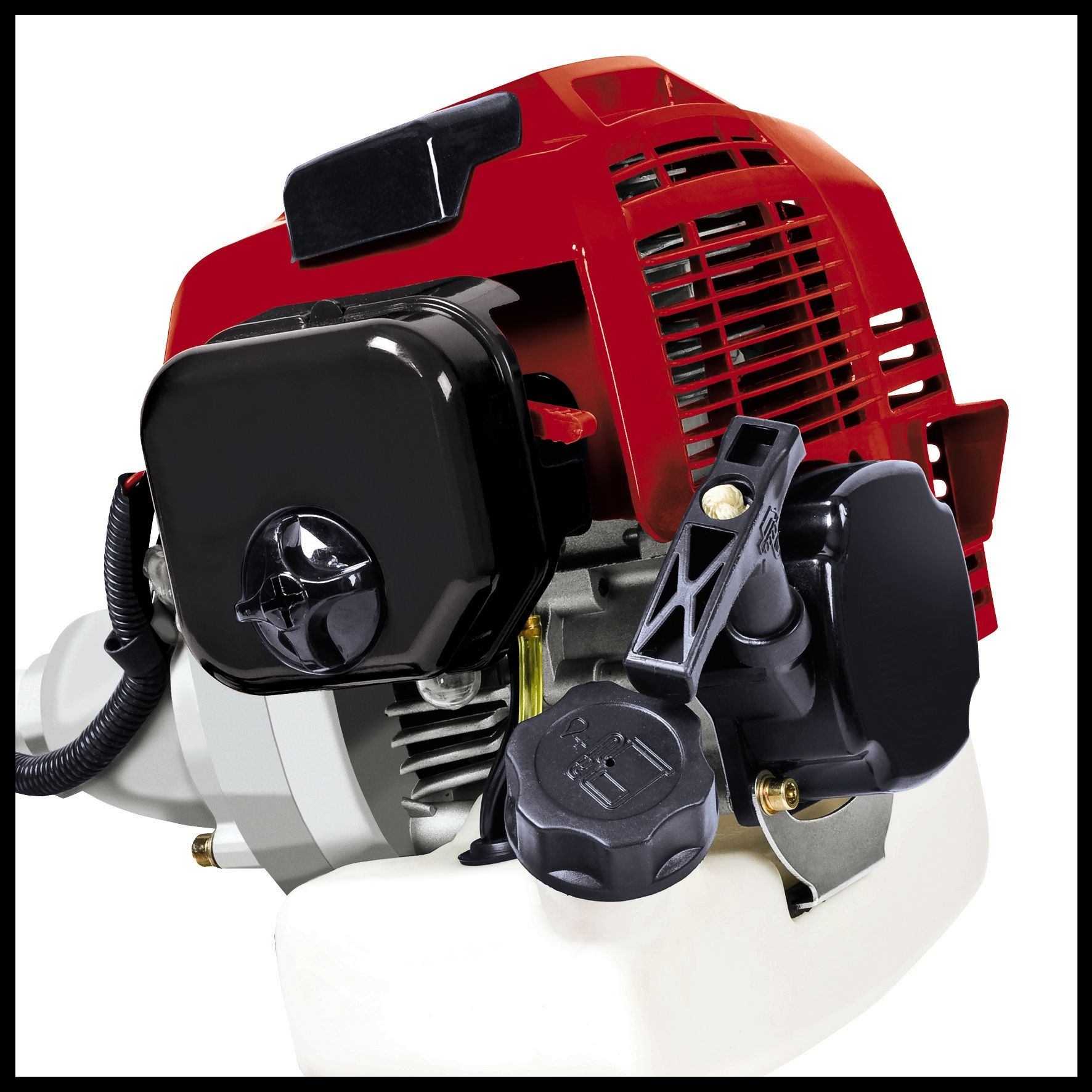 Desbrozadora roja y negra, primer plano del motor. Tapa de combustible negra y otros.