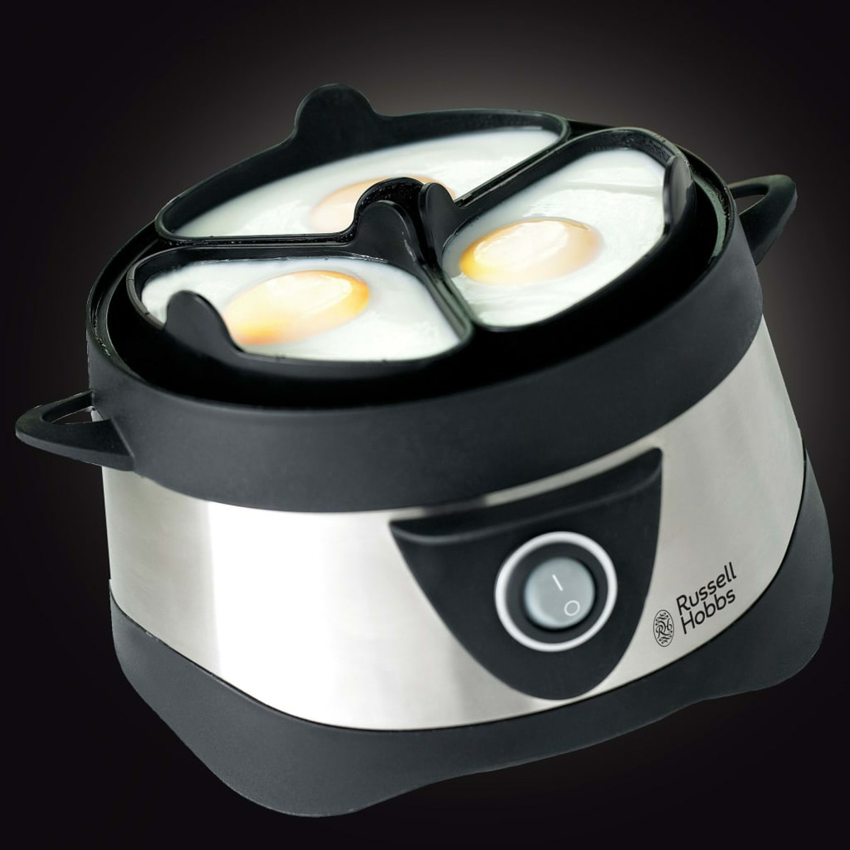 Gotowacz do jajek z trzema jajkami, czarny i srebrny, czarne tło.