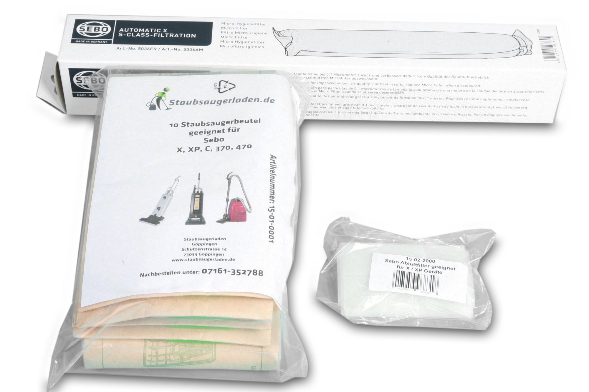 Staubsaugerbeutel und Filterpaket auf weißem Hintergrund.