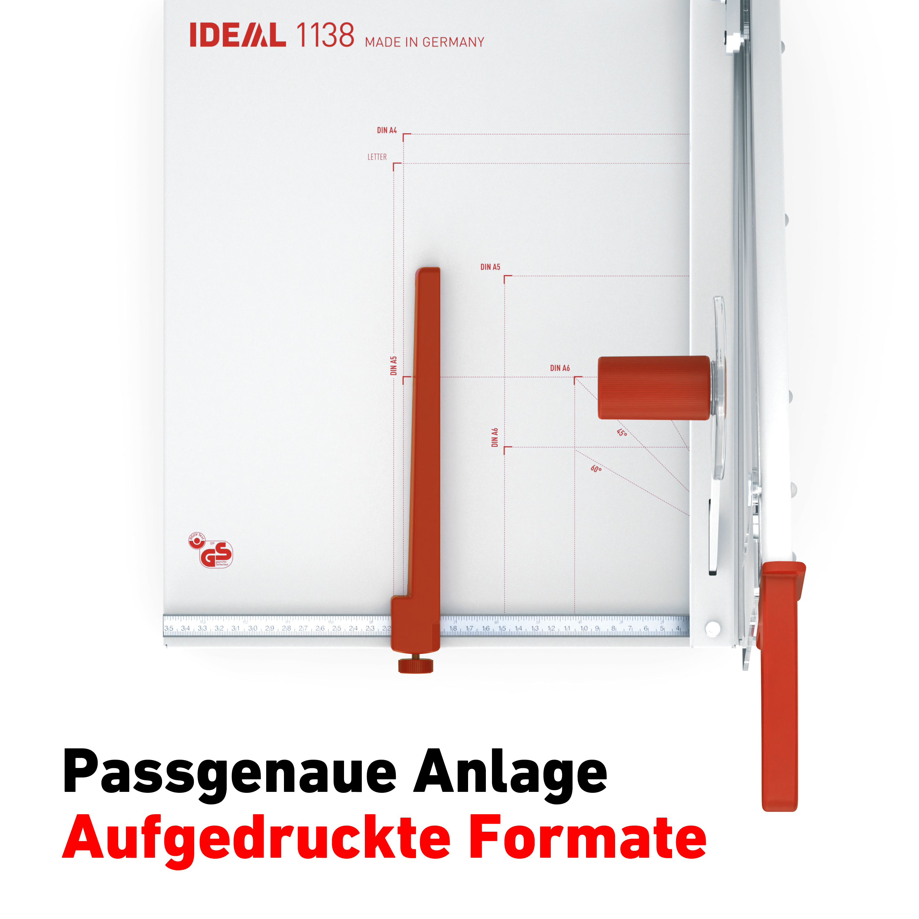 Ein Papierschneider mit roten Akzenten auf einer weißen Oberfläche mit gedruckten Formatanleitungen.
