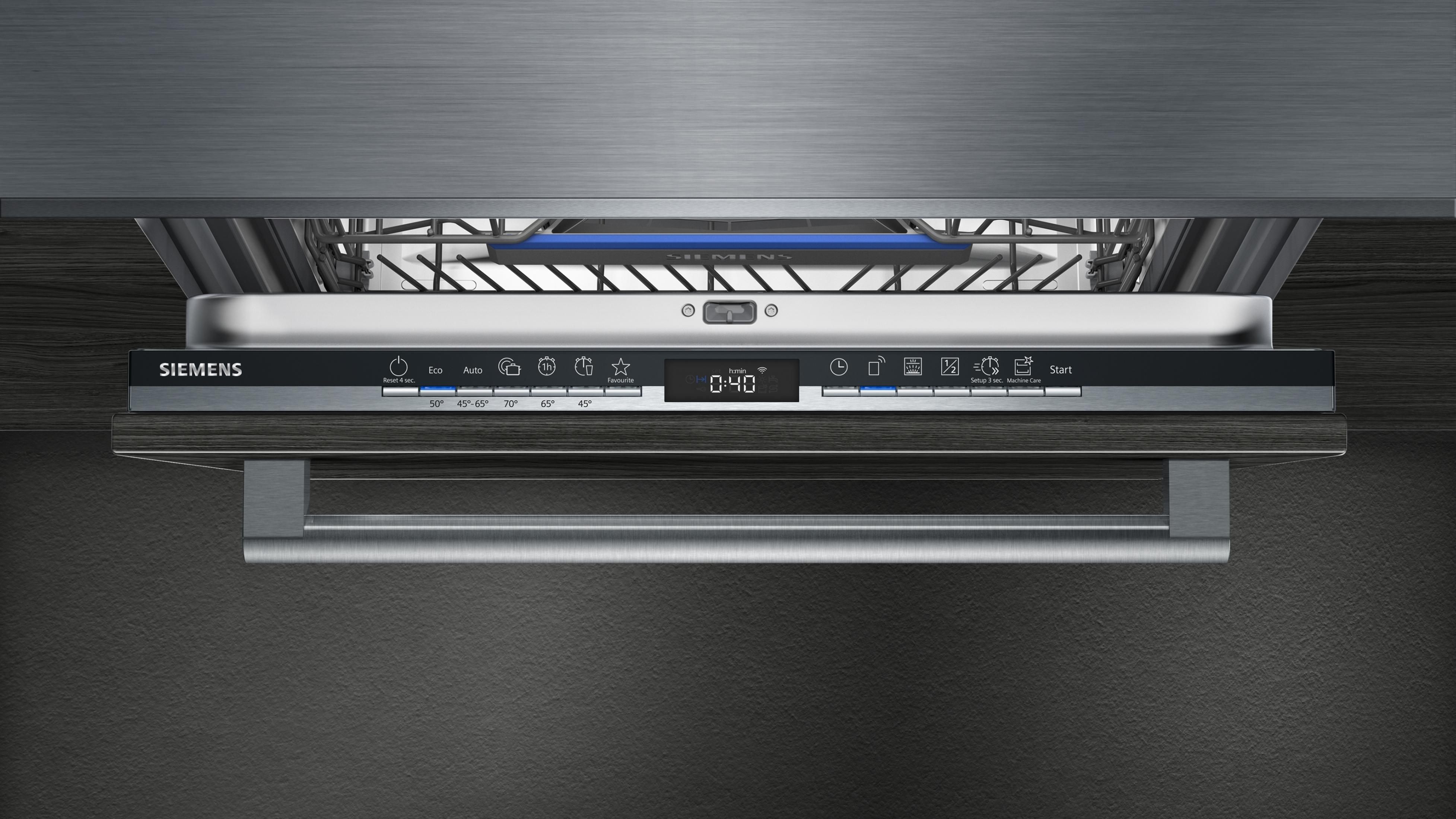 A close-up of a Siemens dishwasher control panel. Digital display visible.