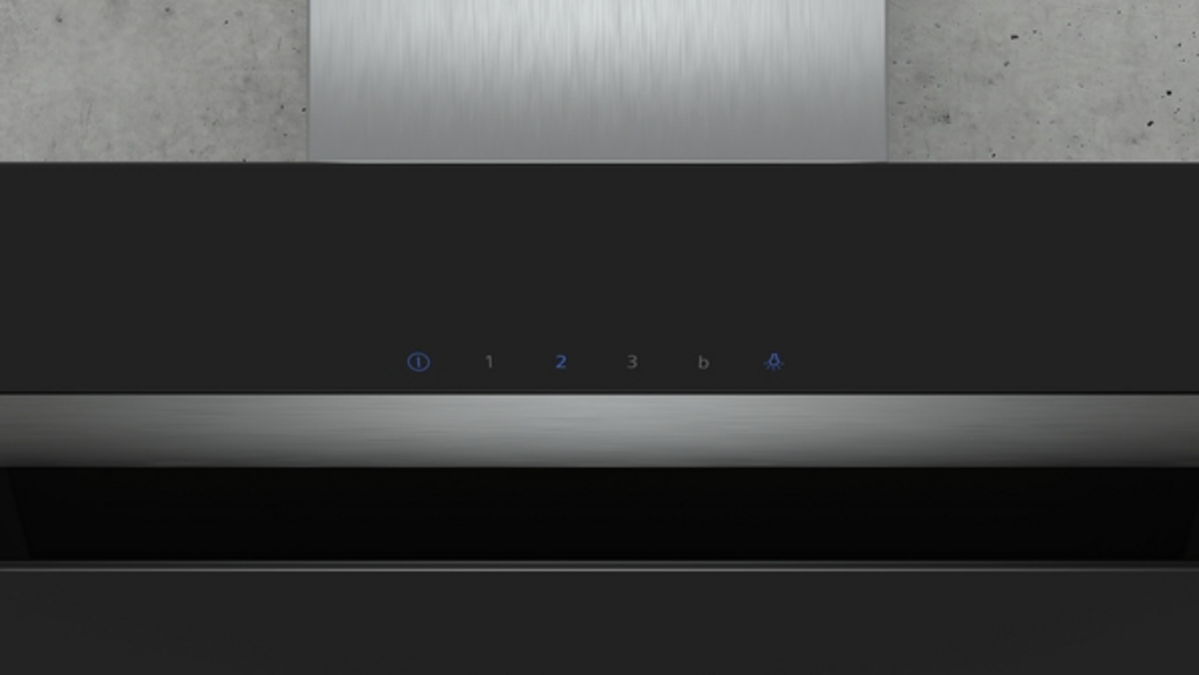 A black range hood with control buttons labeled 1,2,3, and a light symbol.