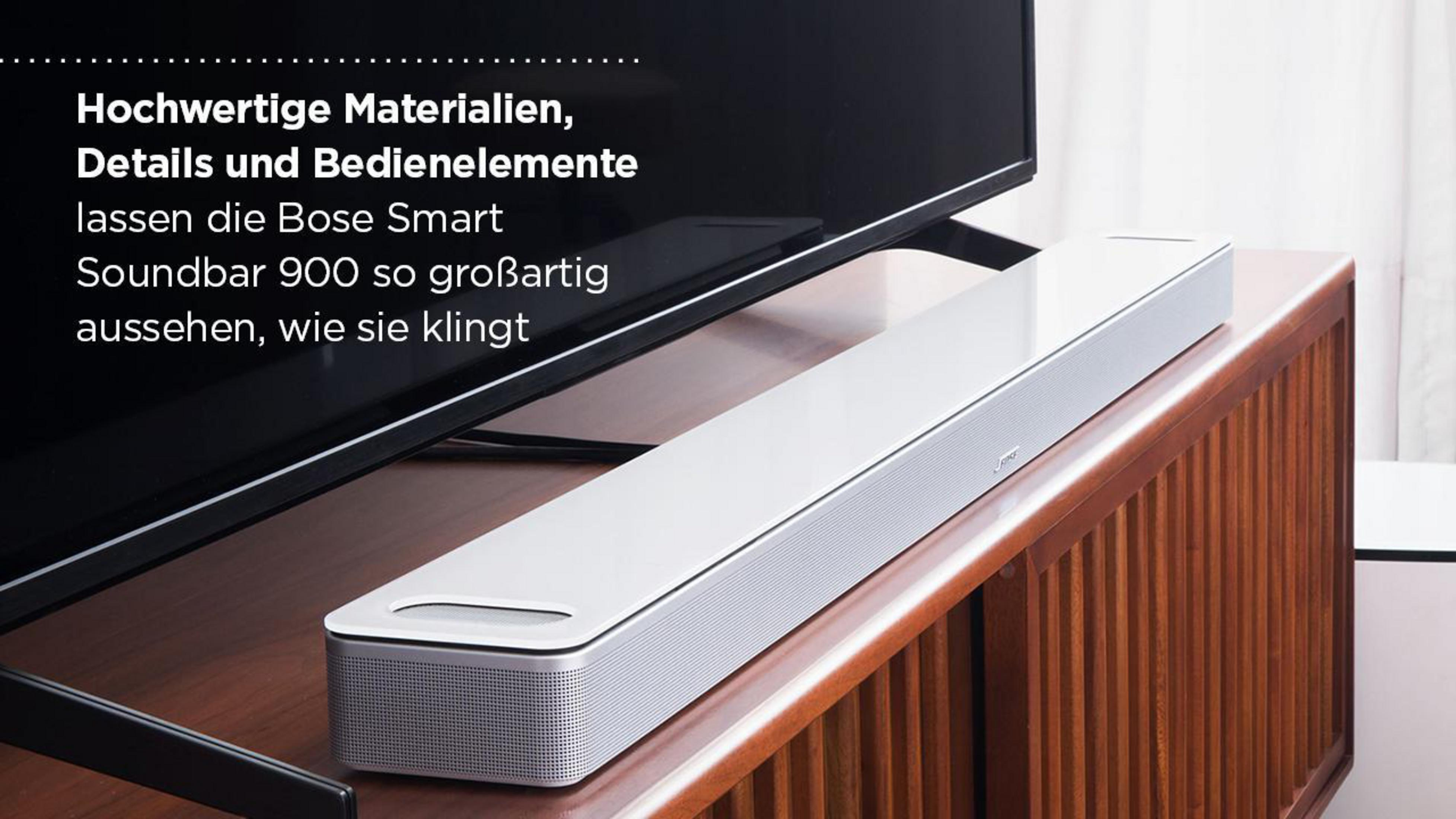 Eine weiße Soundbar auf einer braunen Holzoberfläche, mit Text überlagert.