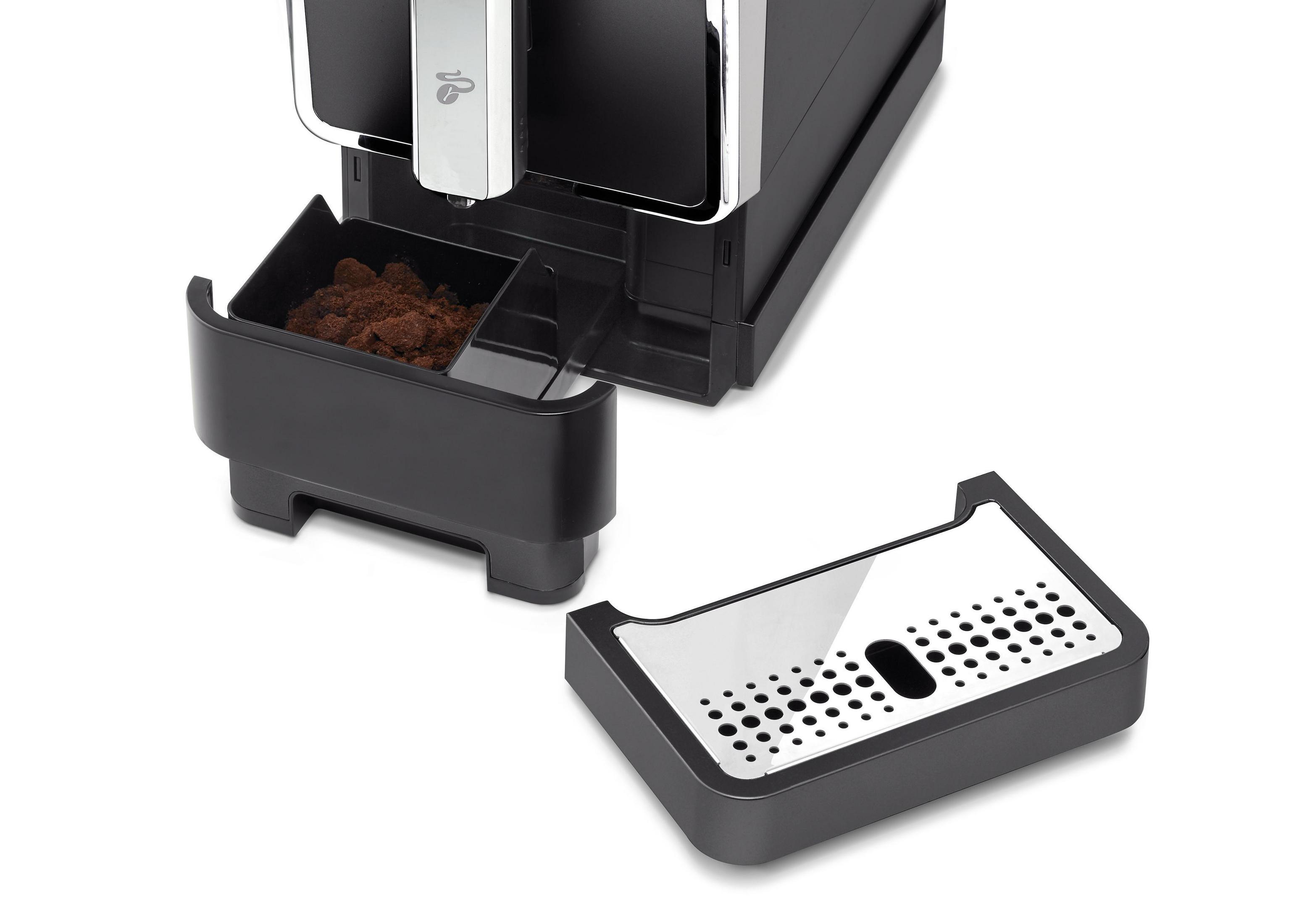 Schwarze Kaffeemaschine mit Abfallbehälter und Kaffeesatzbehälter. Silberne Akzente.
