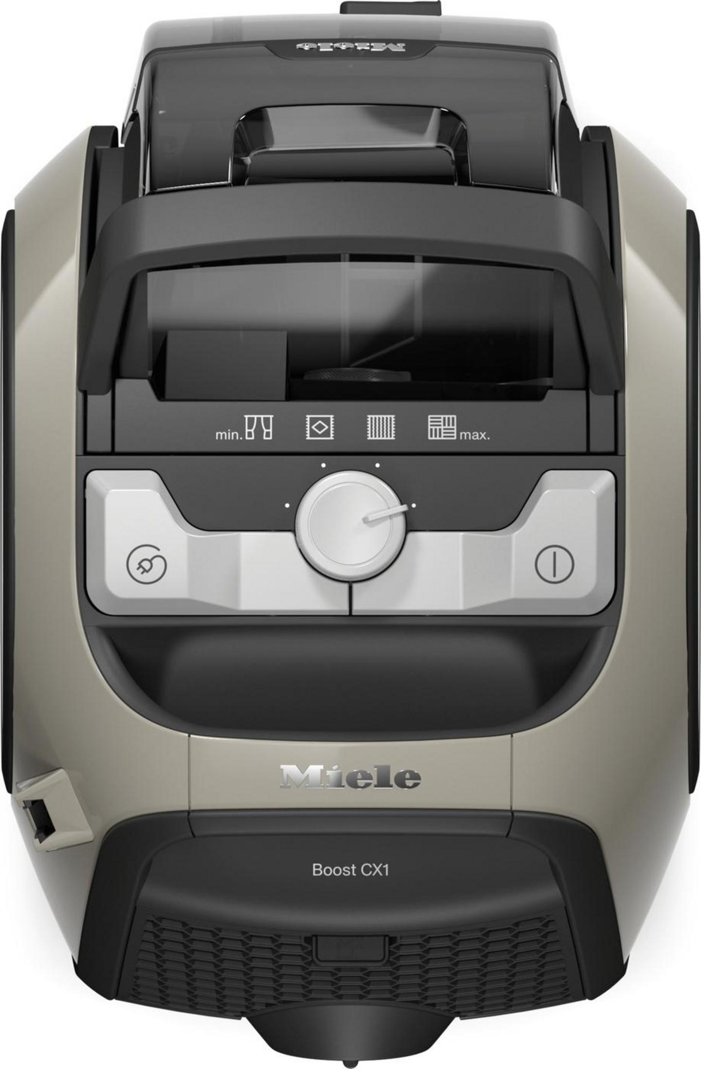 Draufsicht auf einen Miele-Staubsauger. Beige- und Schwarz-Farbschema.