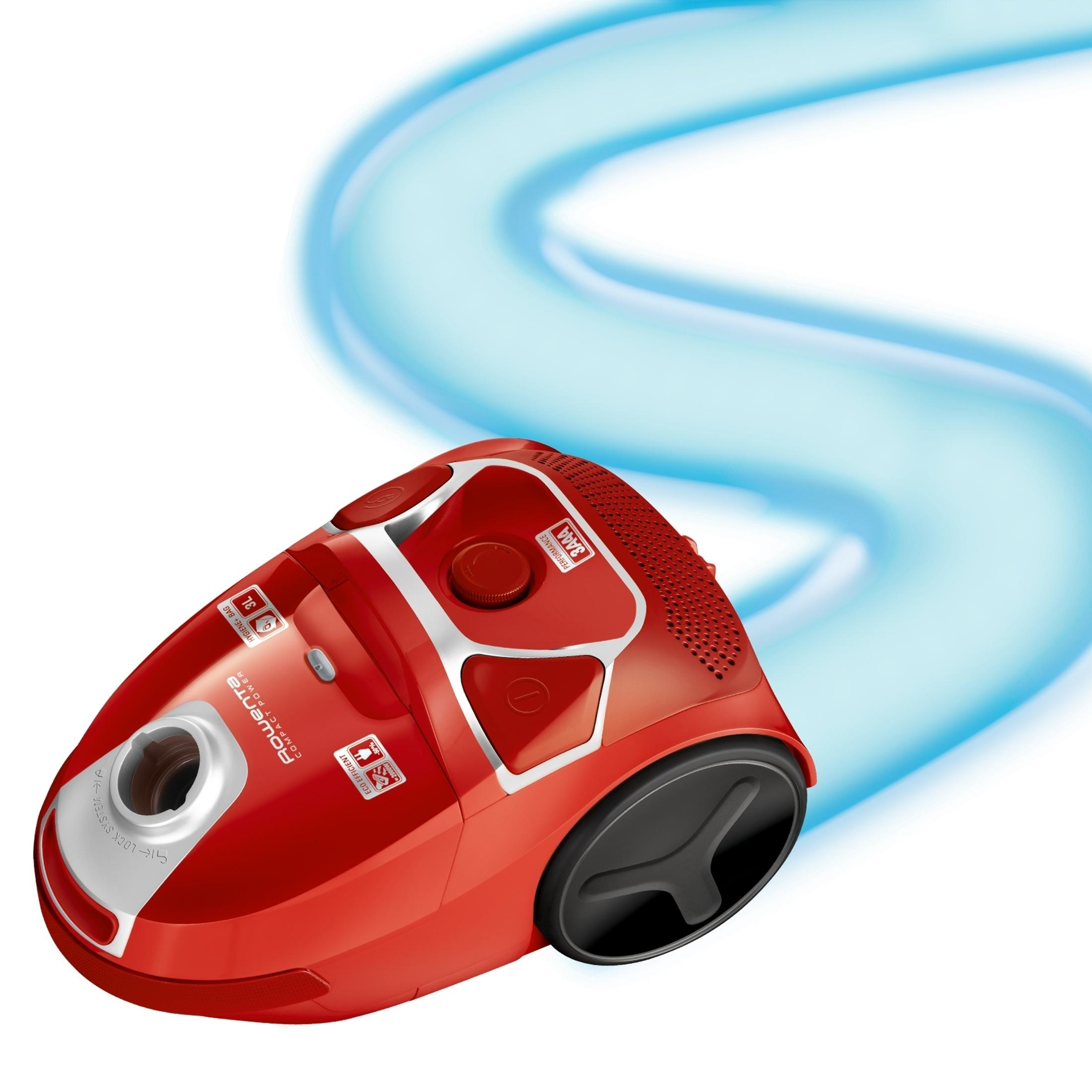 Czerwony odkurzacz z efektem niebieskiego wiru. Białe tło z jasnoniebieską zakrzywioną linią.