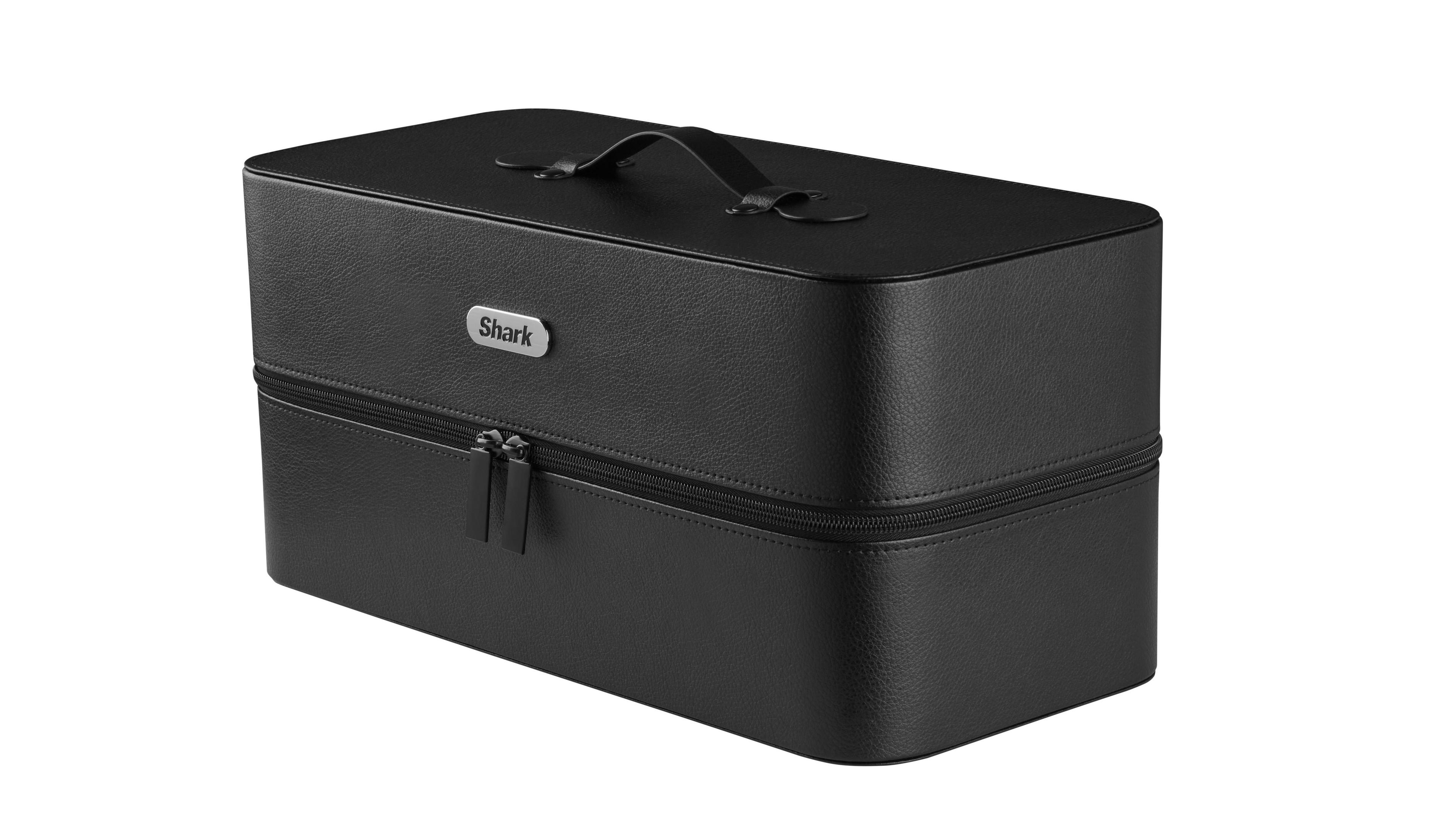 Czarna walizka do stylizacji włosów Shark z uchwytem i zamkiem błyskawicznym na białej powierzchni.
