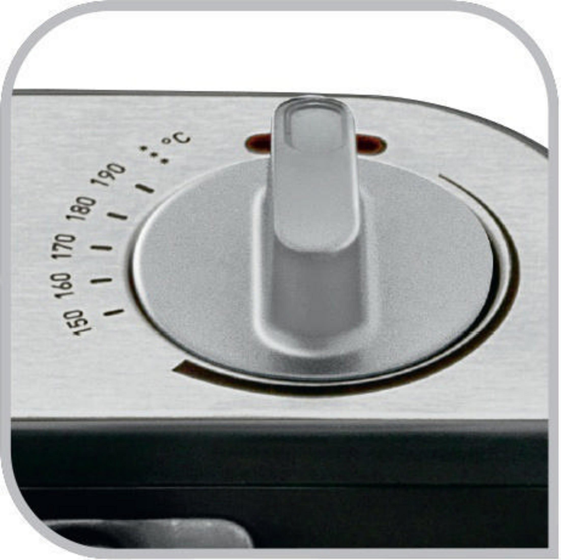 Srebrne pokrętło z oznaczeniami temperatury od 150 do 190 stopni Celsjusza.