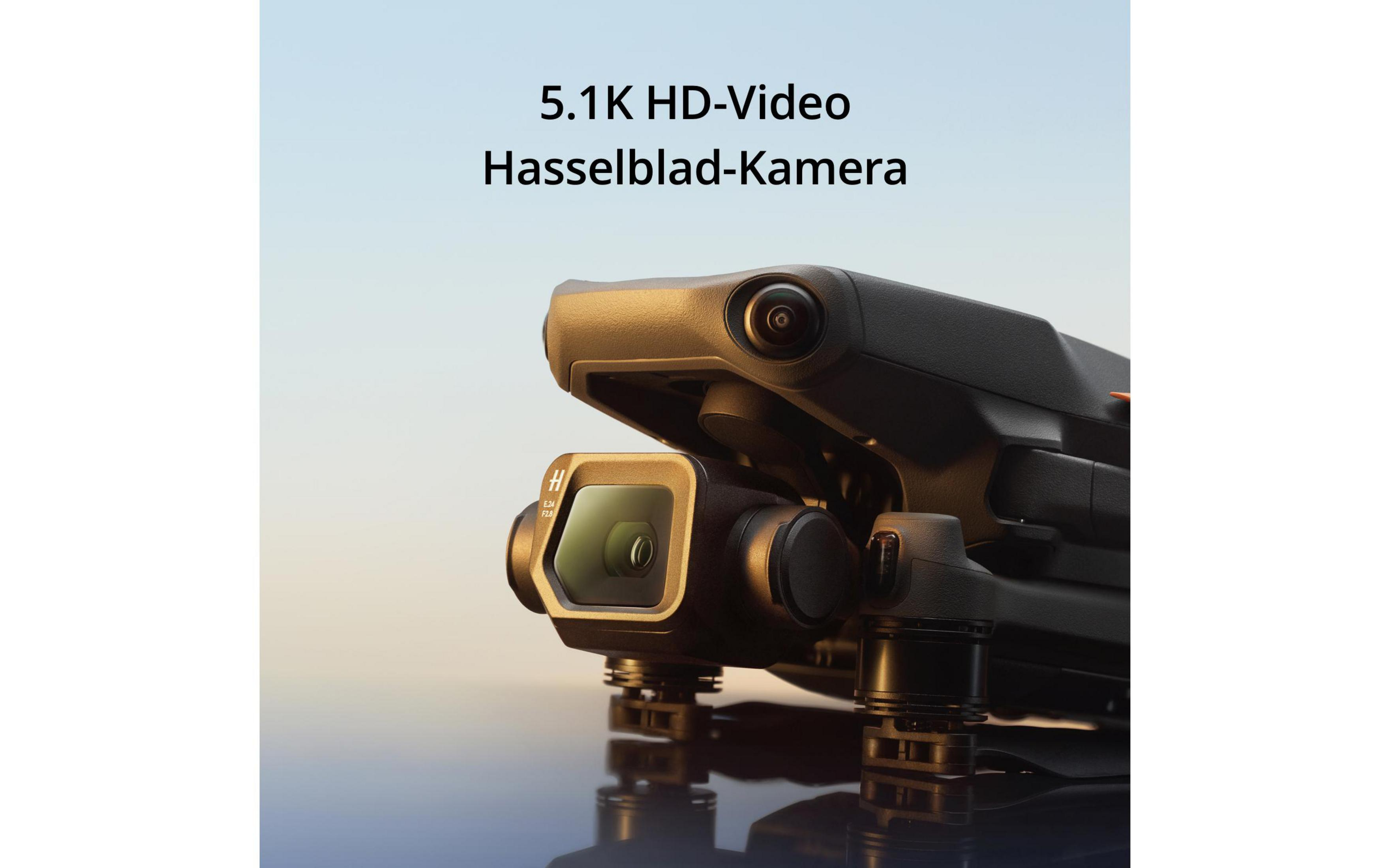 Cámara de dron negra con texto: 5.1K HD-Video Hasselblad-Kamera, contra fondo azul.