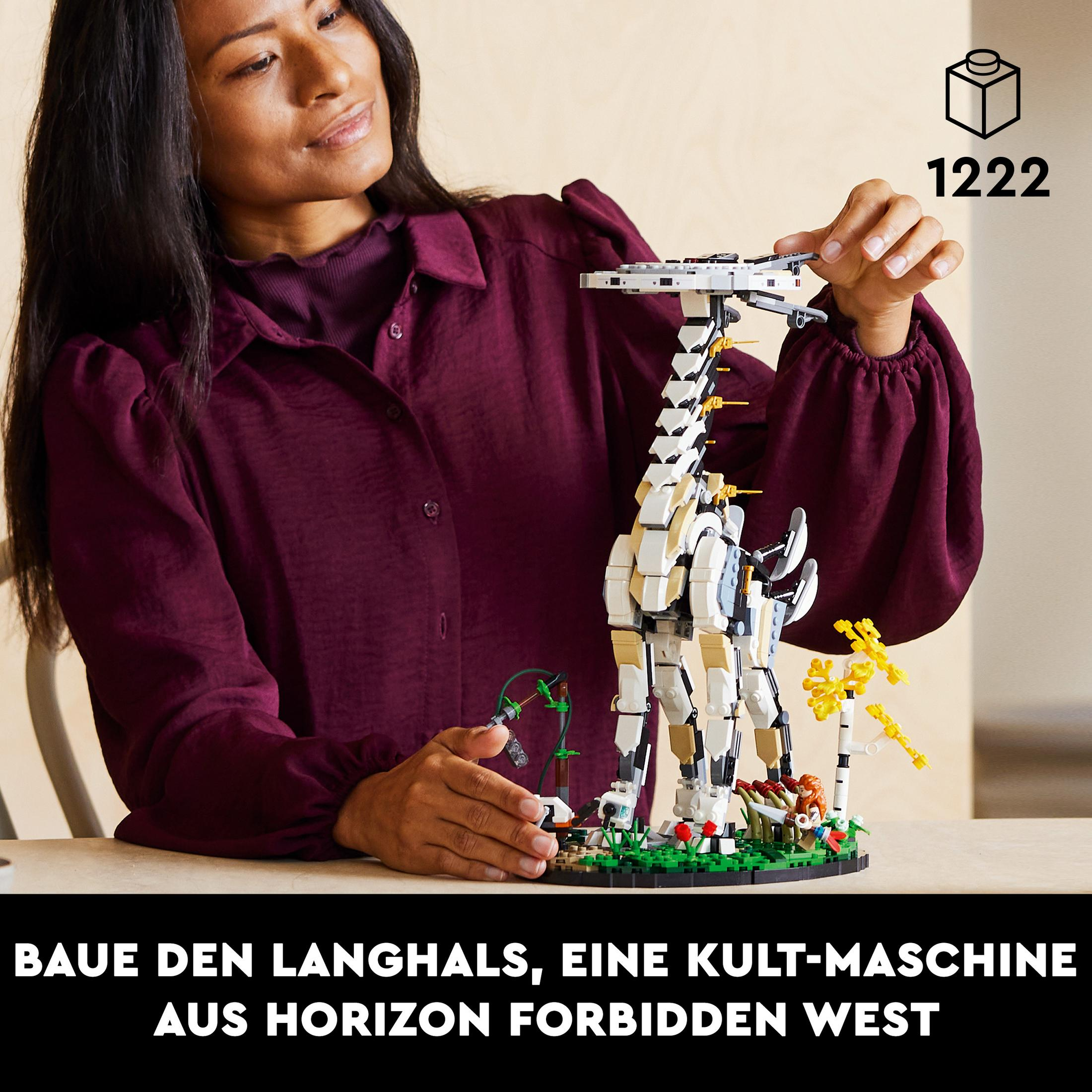 Frau baut LEGO-Giraffe, mit Text: Baue den Langhals, eine Kultmaschine.