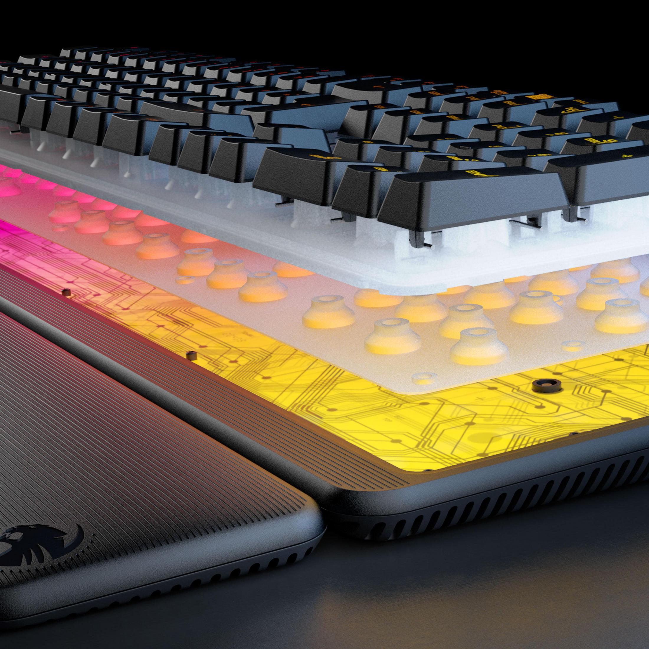 Nahaufnahme der Tastaturschichten mit freiliegenden Tasten und sichtbaren Innenteilen.