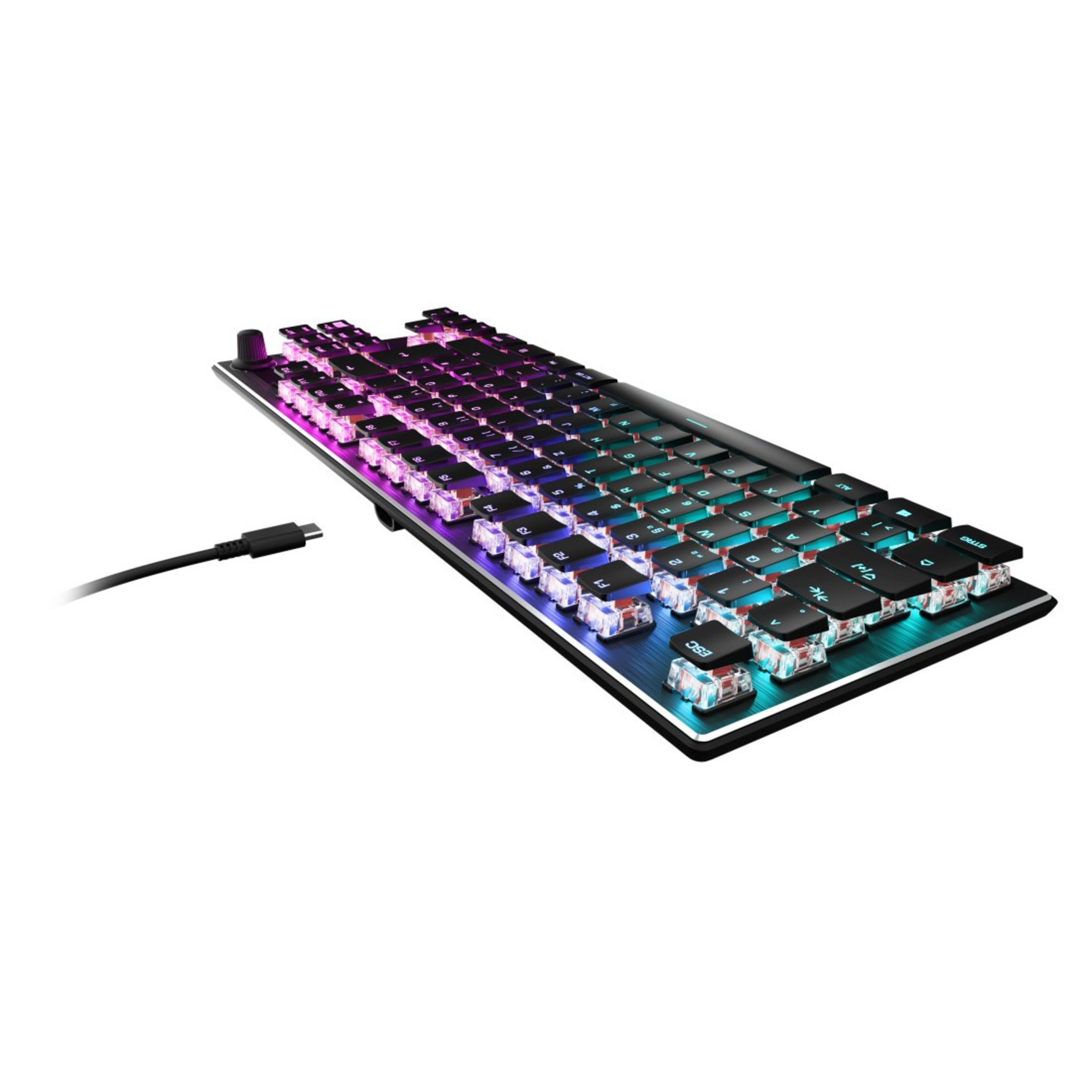 Klawiatura mechaniczna z przezroczystymi nakładkami na klawisze i podświetlanymi klawiszami, podłączona do kabla USB.