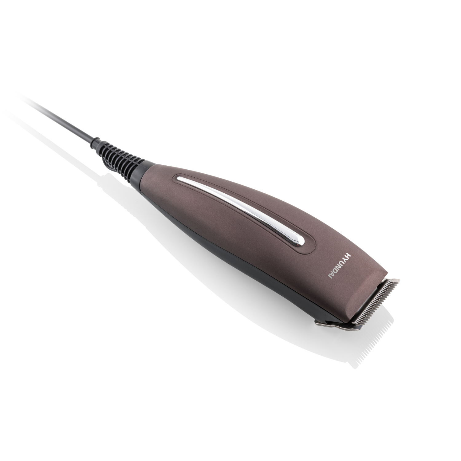 Brauner und schwarzer Hyundai Haartrimmer mit Kabel, auf weißer Oberfläche liegend.