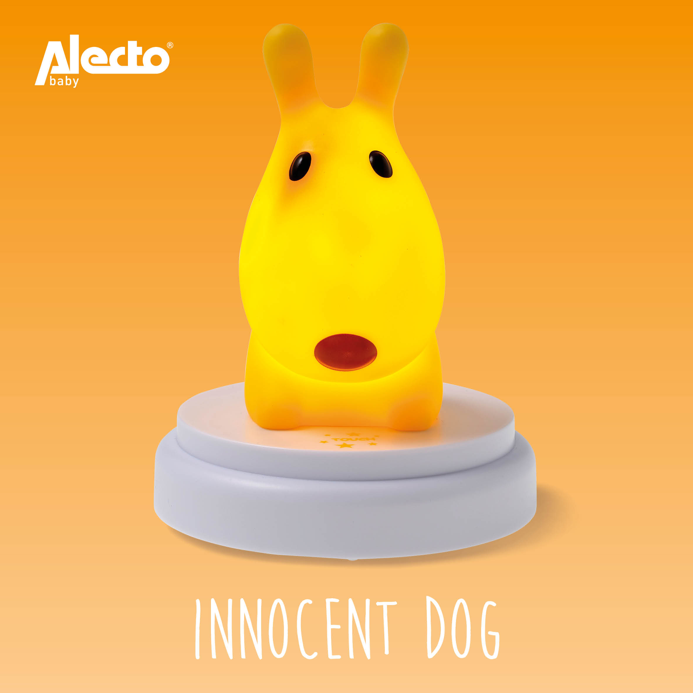 Una luz nocturna amarilla con forma de perro y base blanca. Texto: INNOCENT DOG.