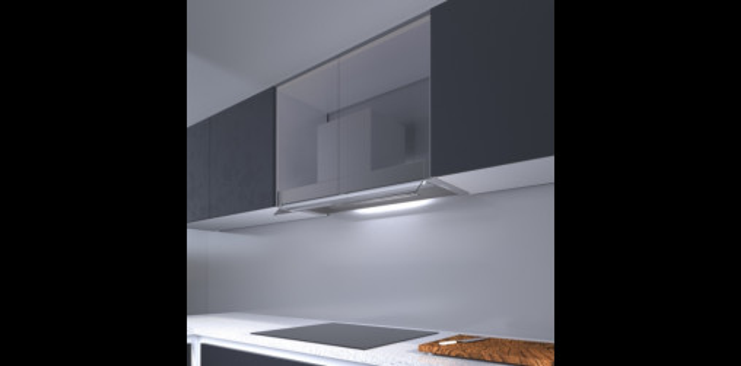 Scena di cucina con mobili scuri, una cappa in acciaio inossidabile e un piano cottura nero.