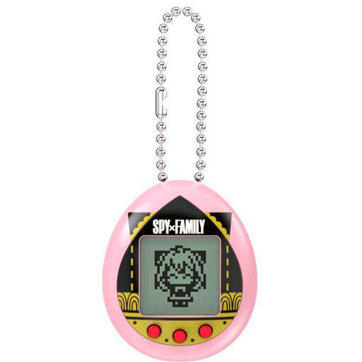 Llavero Tamagotchi rosa con un gráfico de SPY x FAMILY en la pantalla.