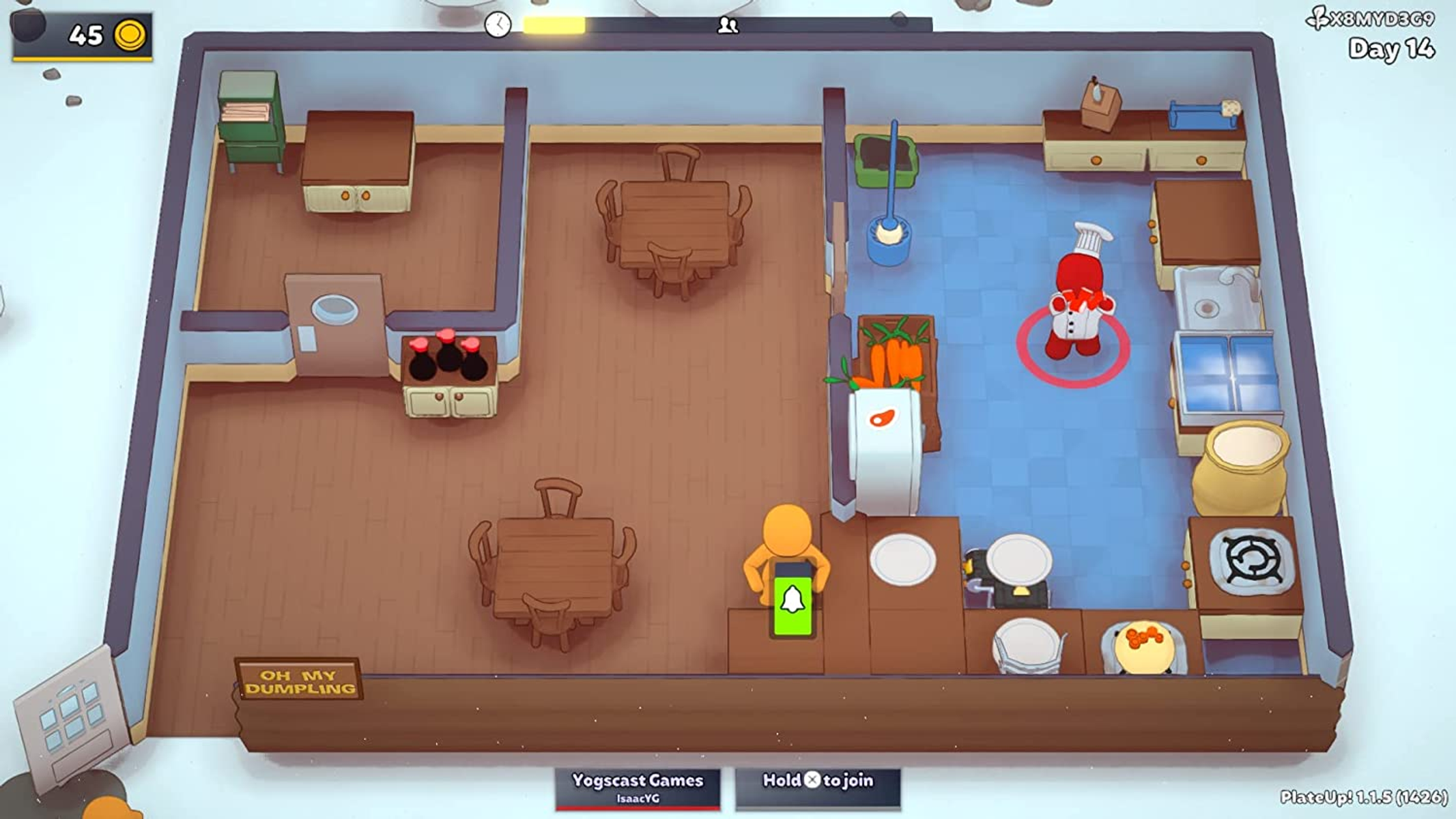 Vista desde arriba de una cocina en un videojuego. Dos personajes son visibles. Un chef está en el centro.