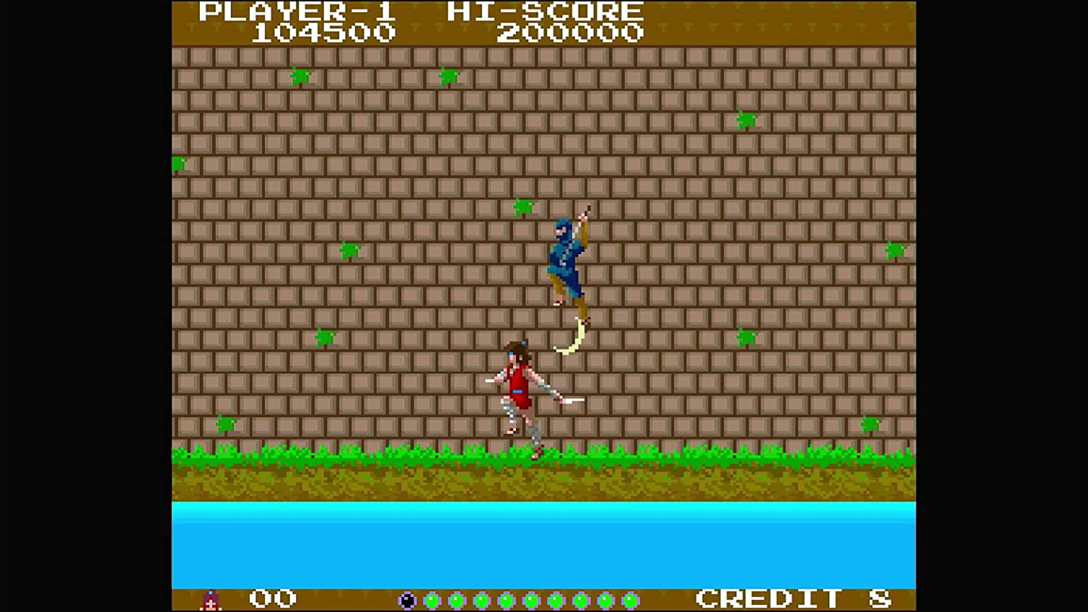 Uno schermo di un videogioco retrò. Un personaggio pixelato salta su un muro, con altri personaggi.