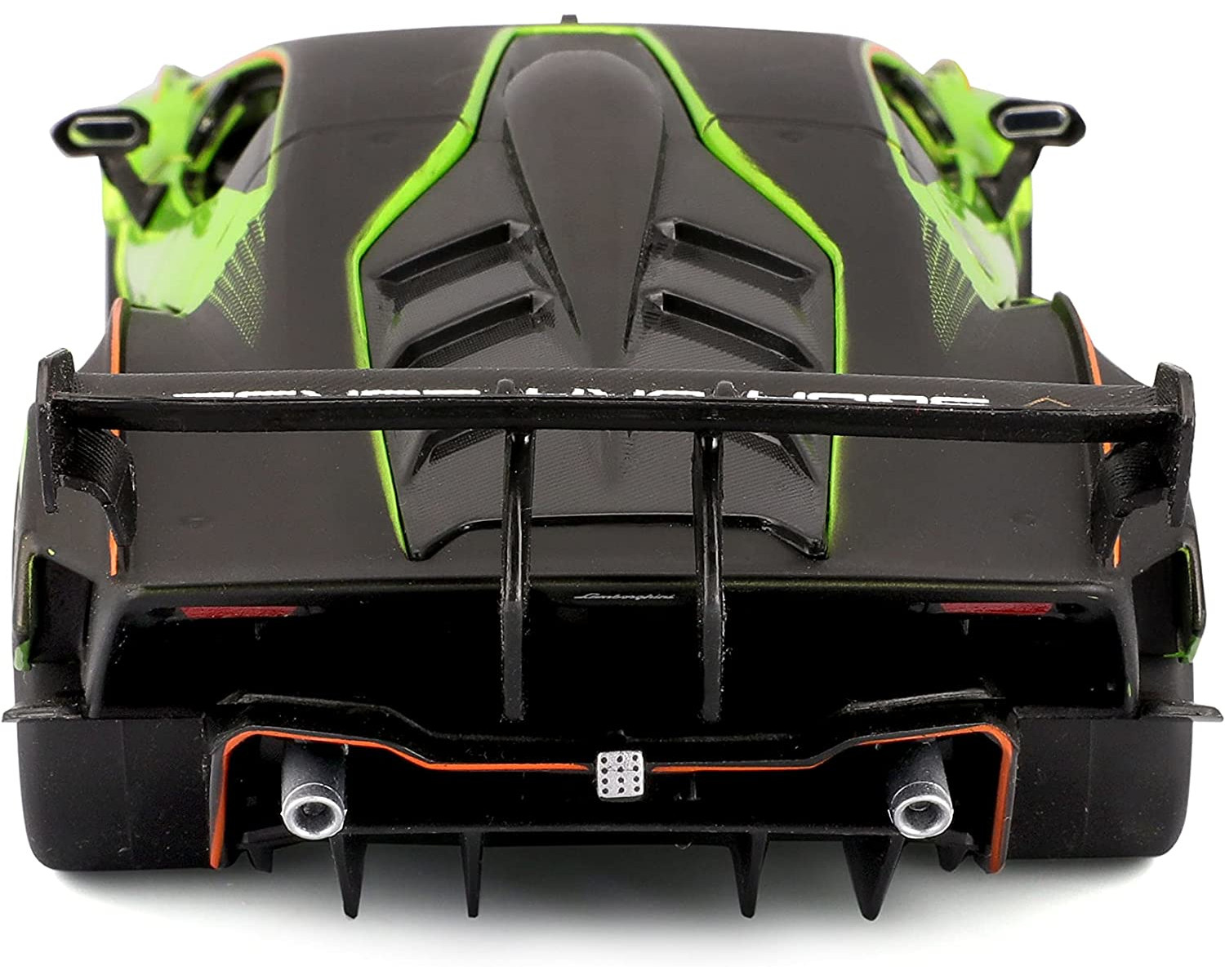 Zbliżenie czarnego i zielonego zabawkowego samochodu sportowego z tyłu.