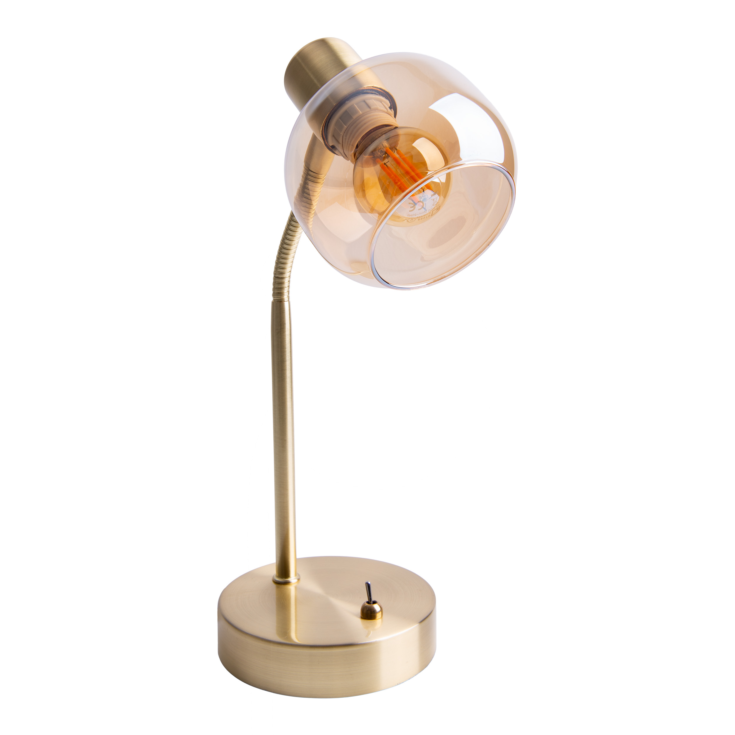 Goldene Schreibtischlampe mit rundem, bernsteinfarbenem Glasschirm und Schalter, weißer Hintergrund.