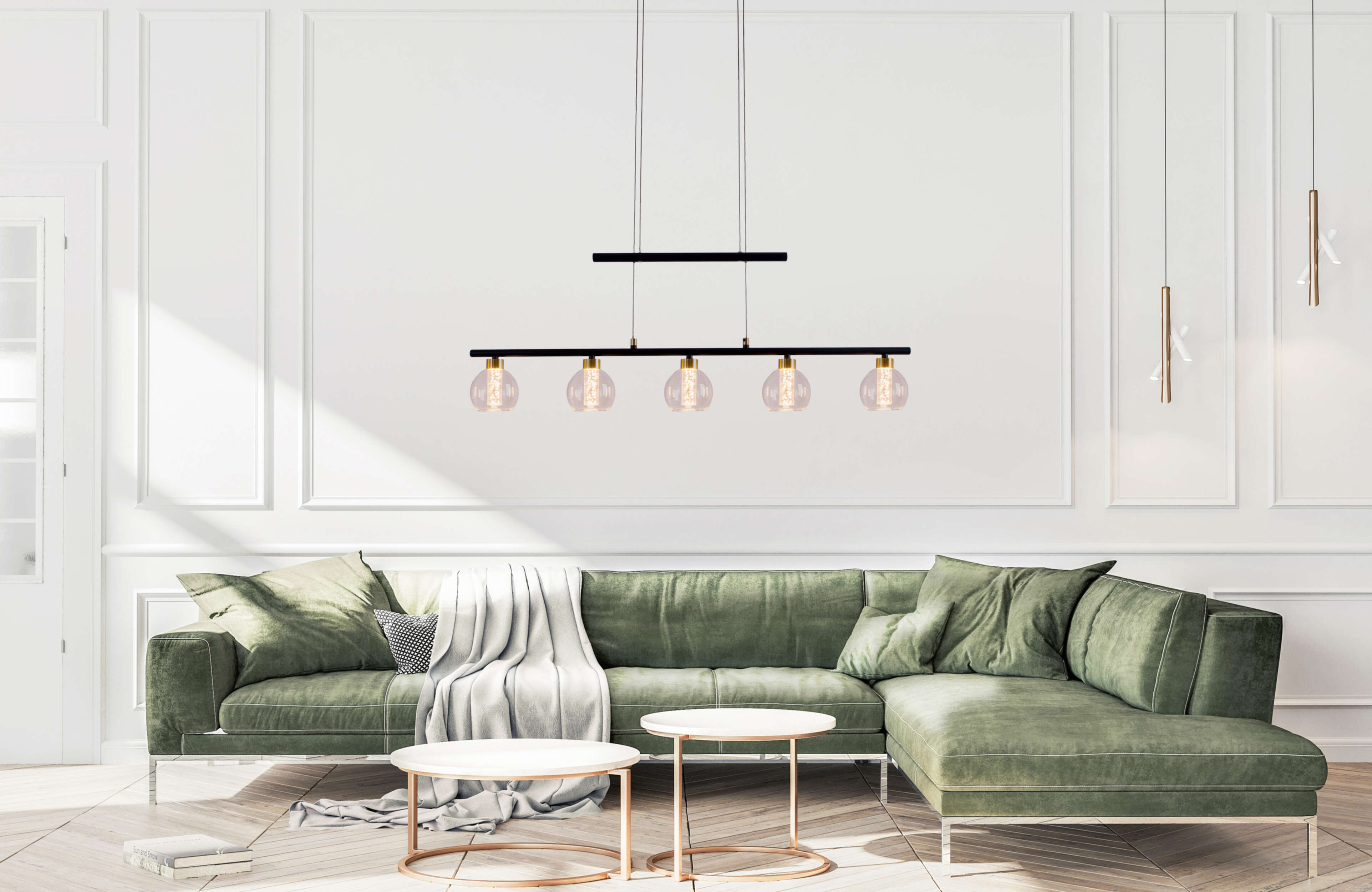 Eine moderne Wohnzimmerszene mit einem grünen Sofa und einer schwarzen Leuchte mit kugelförmigen Lichtern.