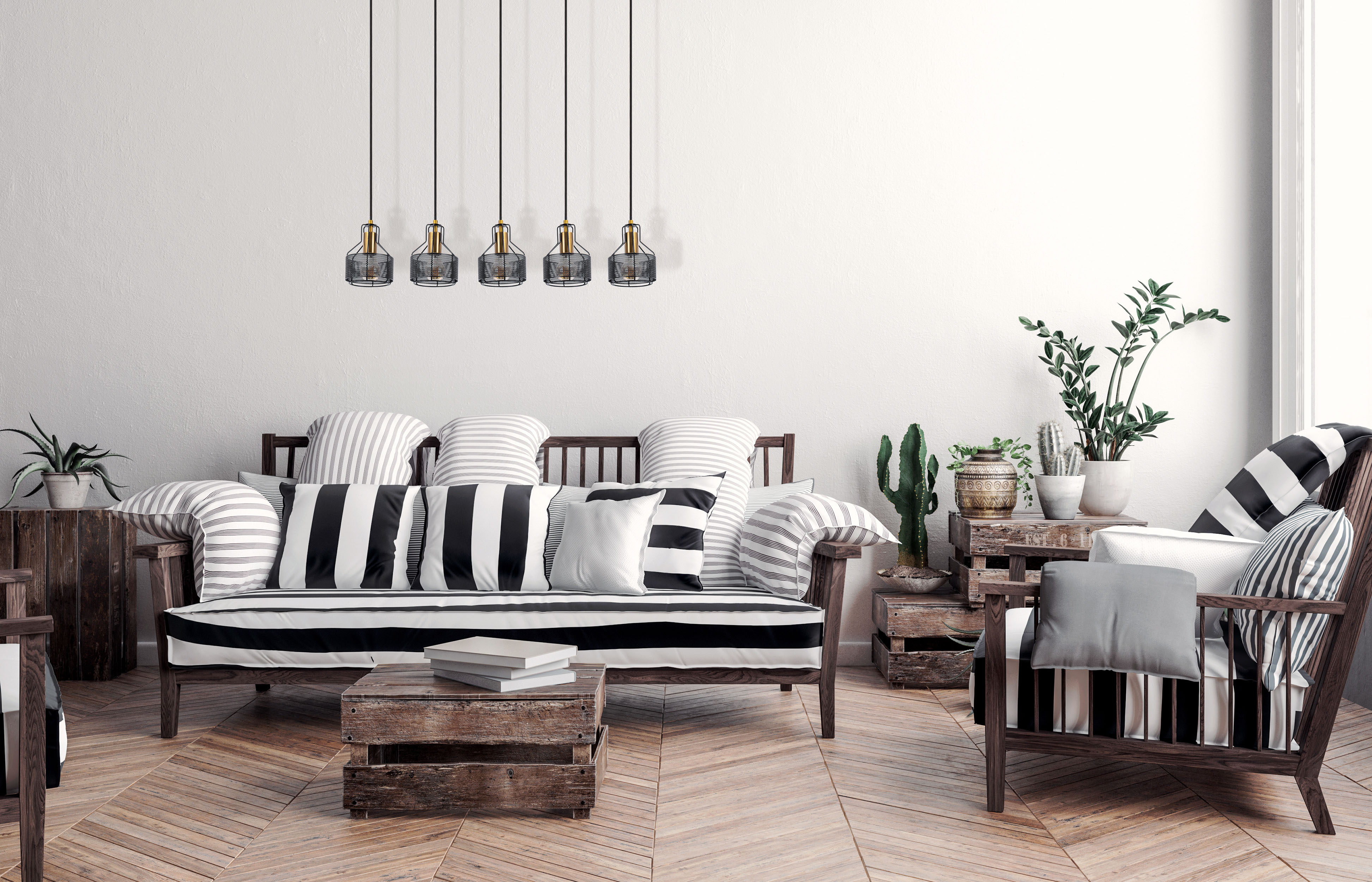 Wohnzimmer mit Sofa, Holzkisten und Pendelleuchten. Holzböden und weiße Wände.