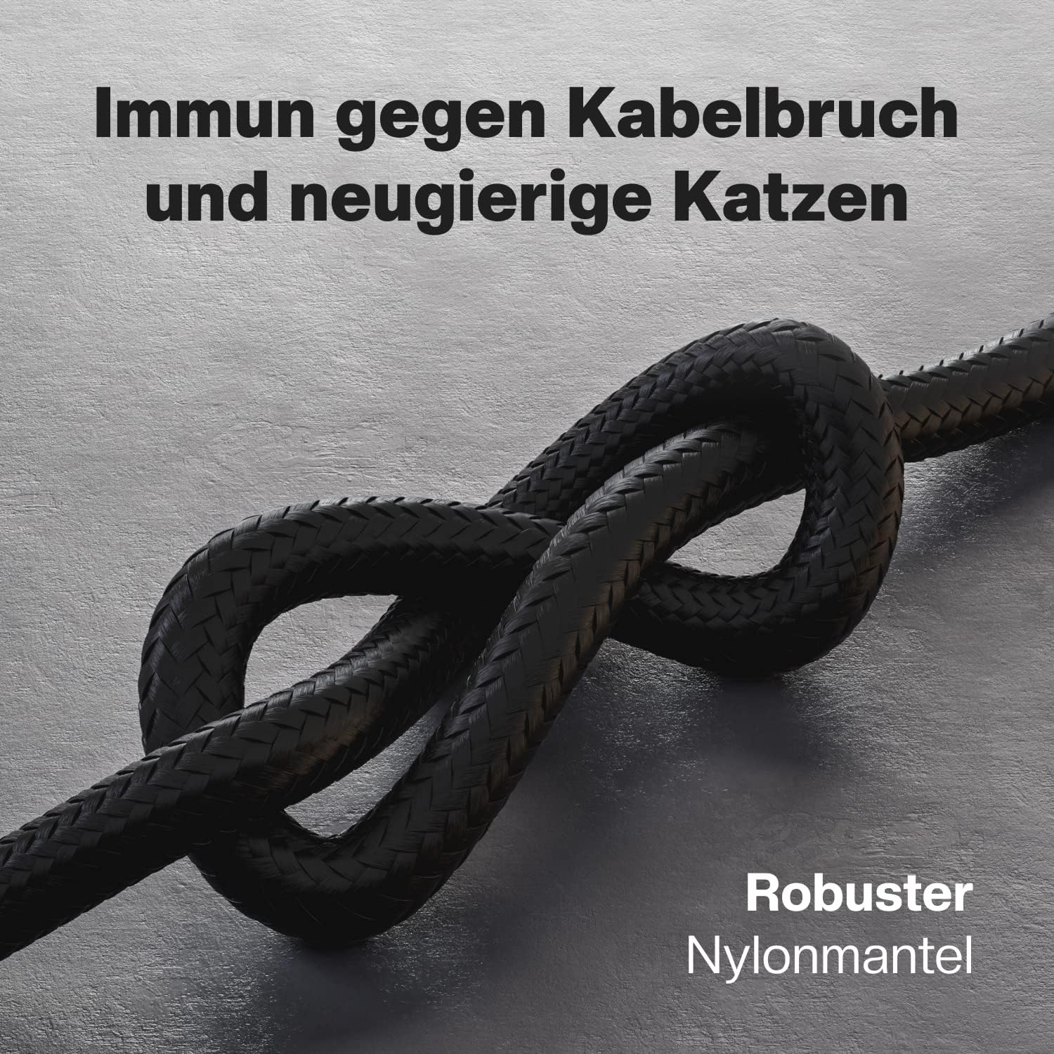 Schwarzes geflochtenes Kabel, das in einem Knoten gebunden ist. Text besagt, dass es robust und nylonbeschichtet ist.