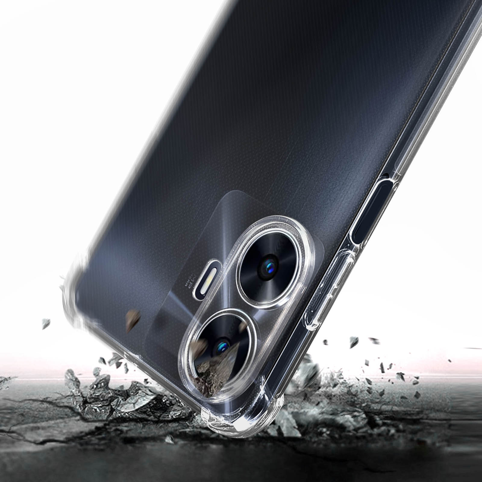 Un telefono con una custodia trasparente sta cadendo, frantumando il terreno sottostante. Lenti della fotocamera a fuoco.