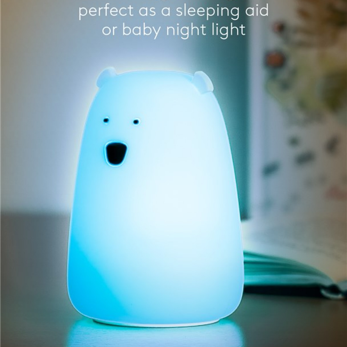Weißes bärenförmiges Nachtlicht, blau leuchtend. Perfekt als Schlafhilfe oder Baby-Nachtlicht.