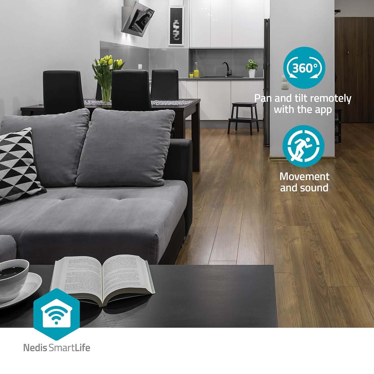 Soggiorno con funzioni smart home. Divano, tavolo, libro aperto e telefono.