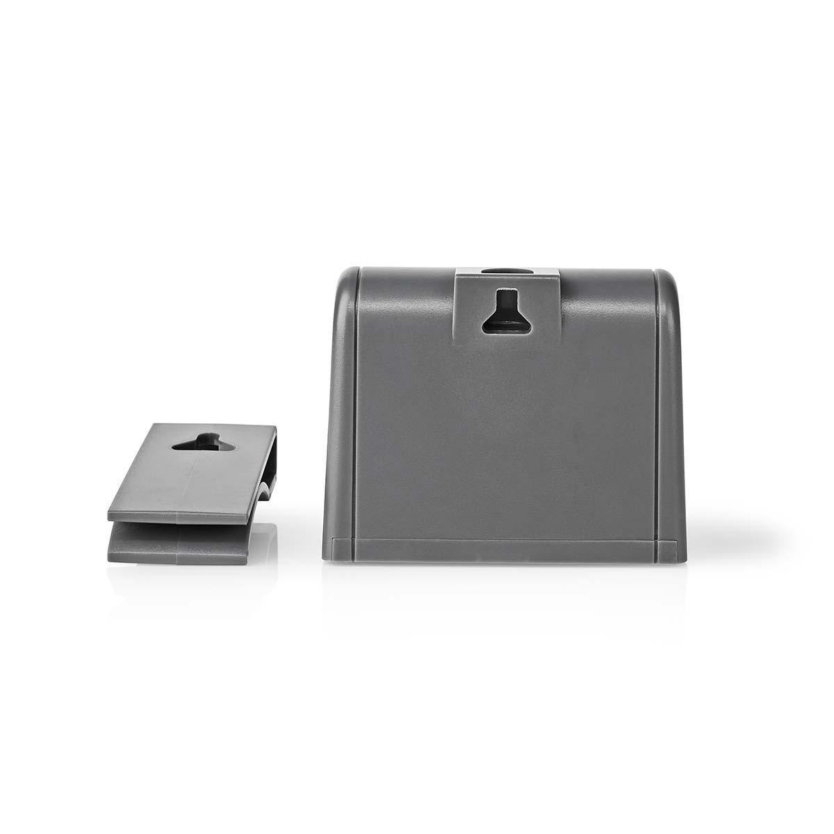Een grijze wandbevestiging met een aparte clip, beide ontworpen om een apparaat op te hangen.