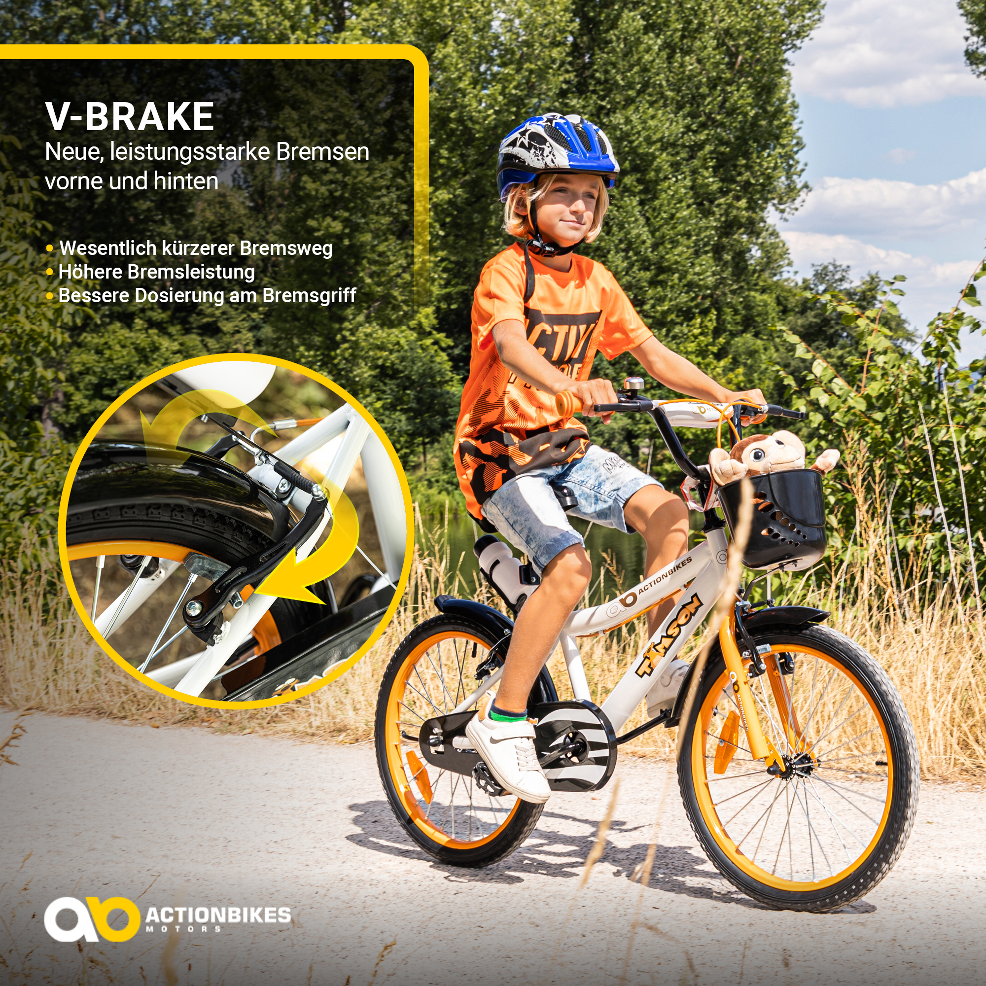 Ein Kind fährt mit einem weiß-orangenen Fahrrad. Das Fahrrad hat einen Korb mit einem Spielzeug. Text über V-Bremsen ist vorhanden.
