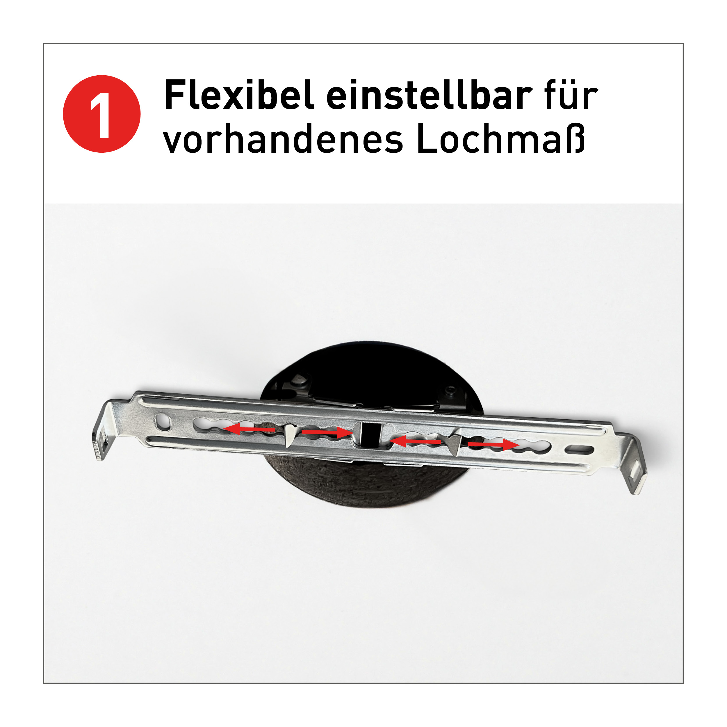 Metallhalterung mit Schlitzen und roten Pfeilen, montiert auf einem schwarzen Kreis, weißer Hintergrund.