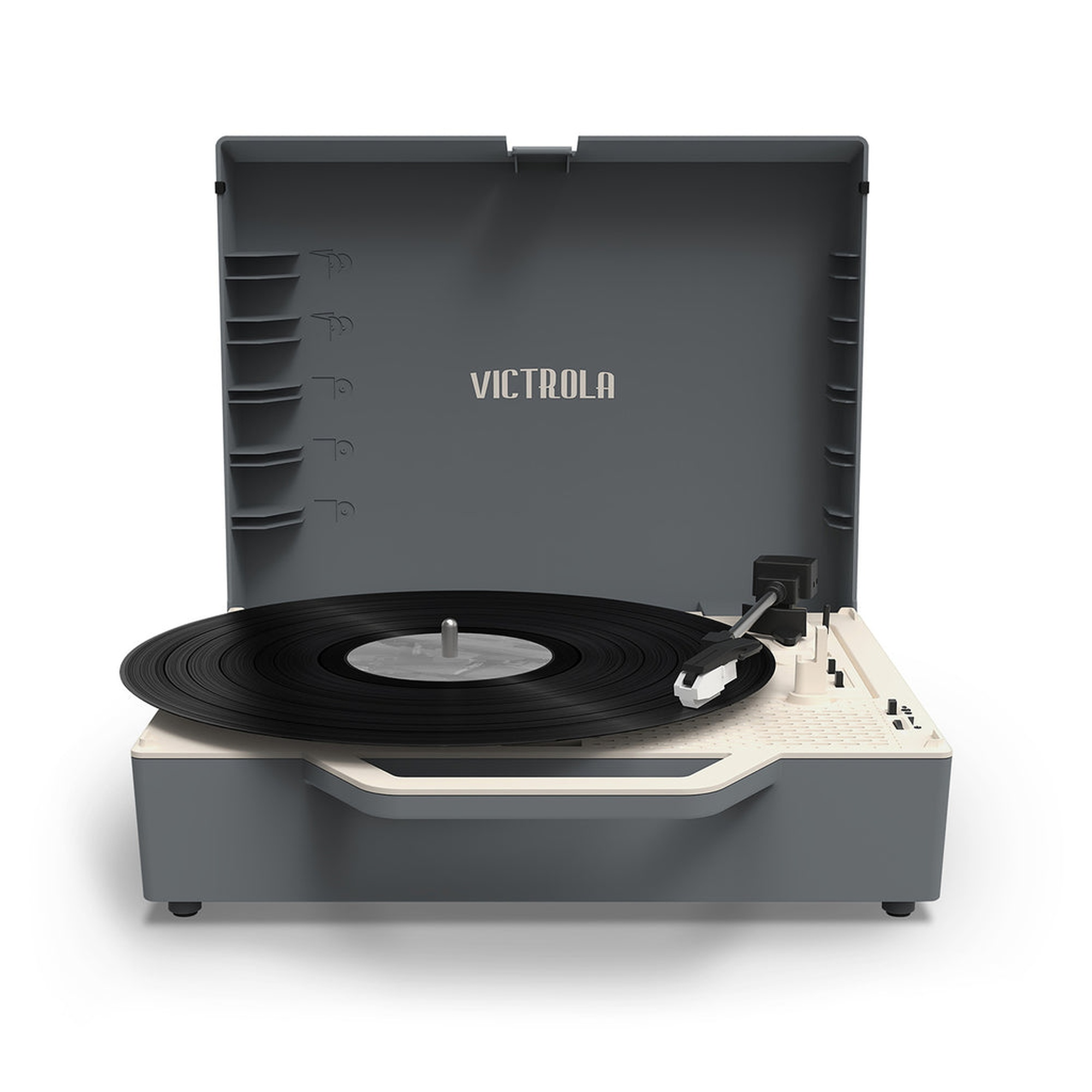 Un tocadiscos Victrola gris con un disco negro reproduciéndose, tapa abierta.
