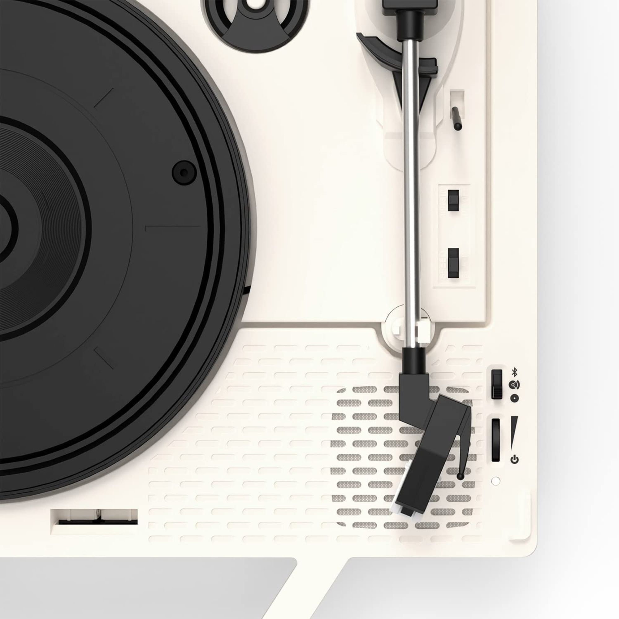 Tocadiscos con disco negro y marco blanco. Vista superior.