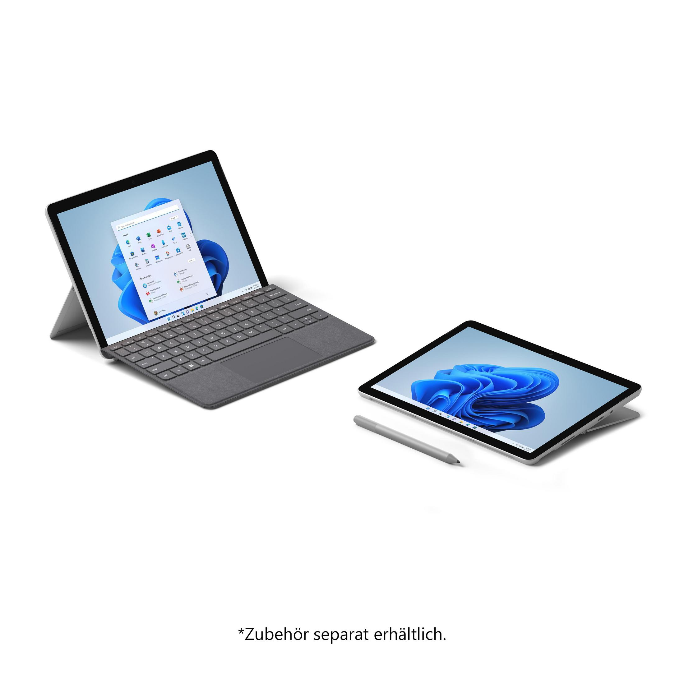 Zwei Laptops auf einer weißen Oberfläche. Einer ist geöffnet, der andere geschlossen. Ein Stift ist enthalten.