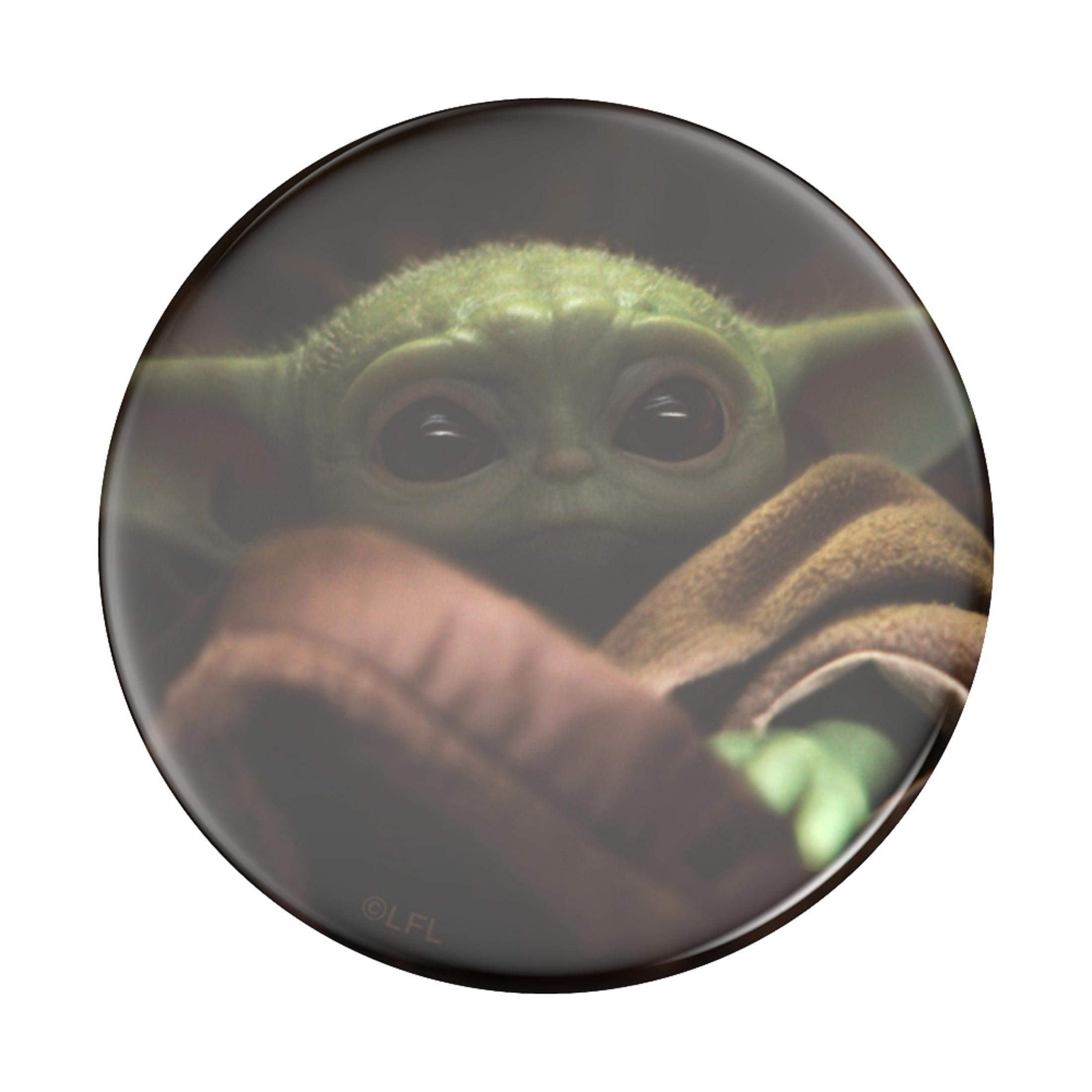 Ein PopSocket mit einem Grogu-Bild. Grogu liegt in einer braunen Decke und schaut nach oben.