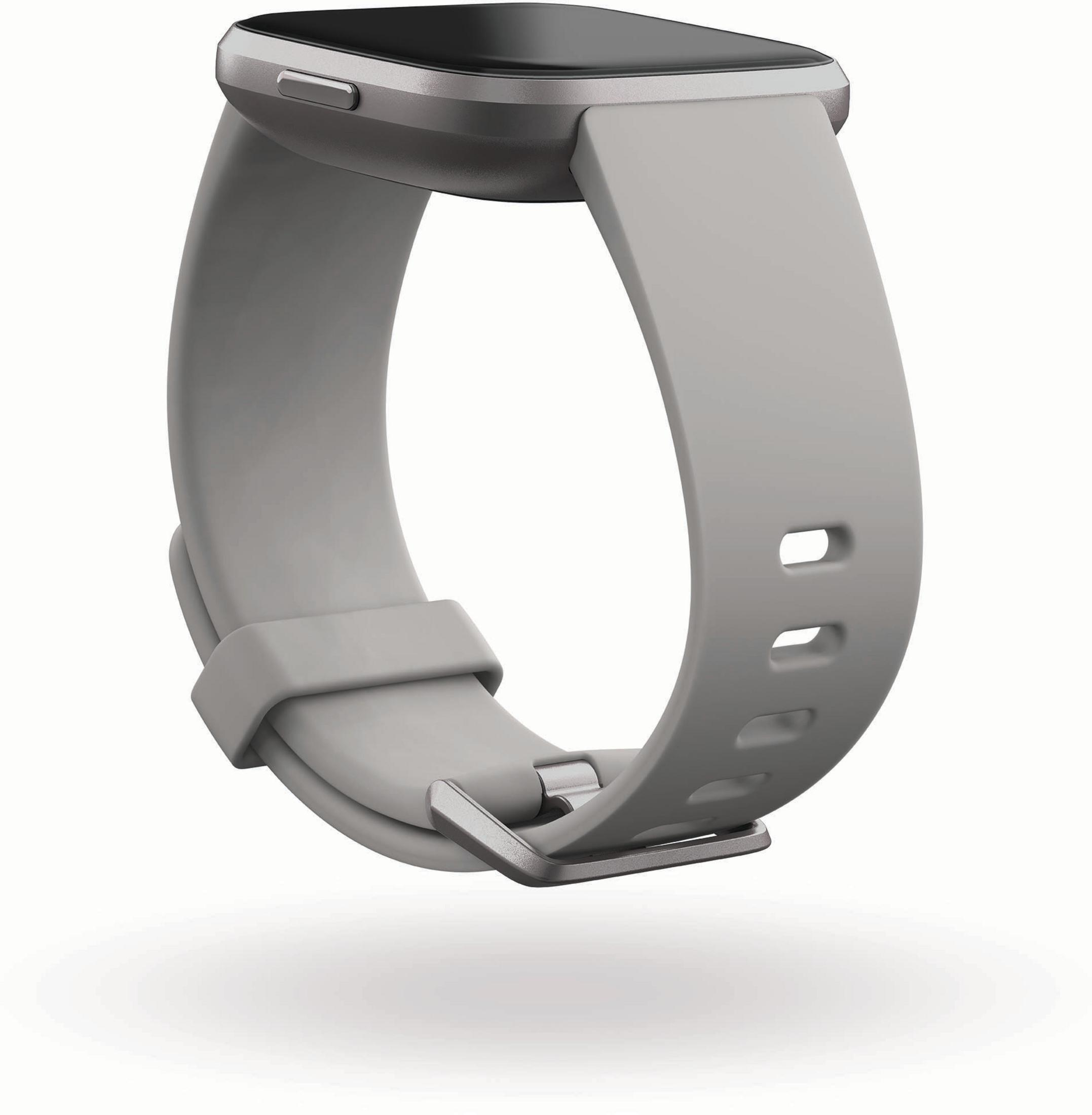 Eine graue Smartwatch mit hellgrauem Band wird vor weißem Hintergrund gezeigt.